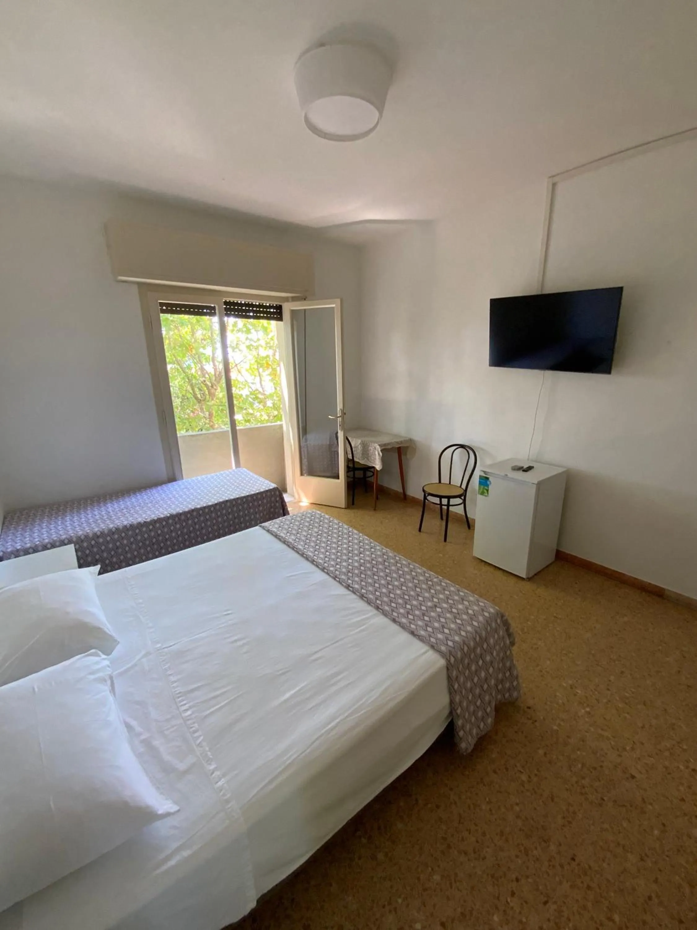 Bed in Hotel Naviglio