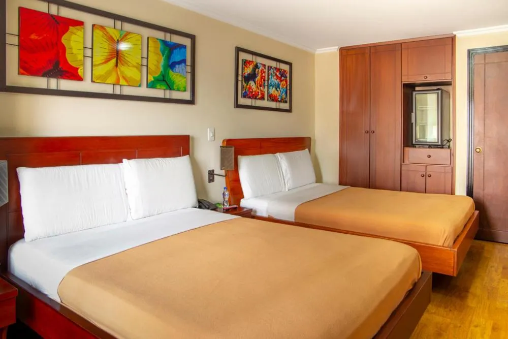 Bed in Hotel Splendor by Friends Company