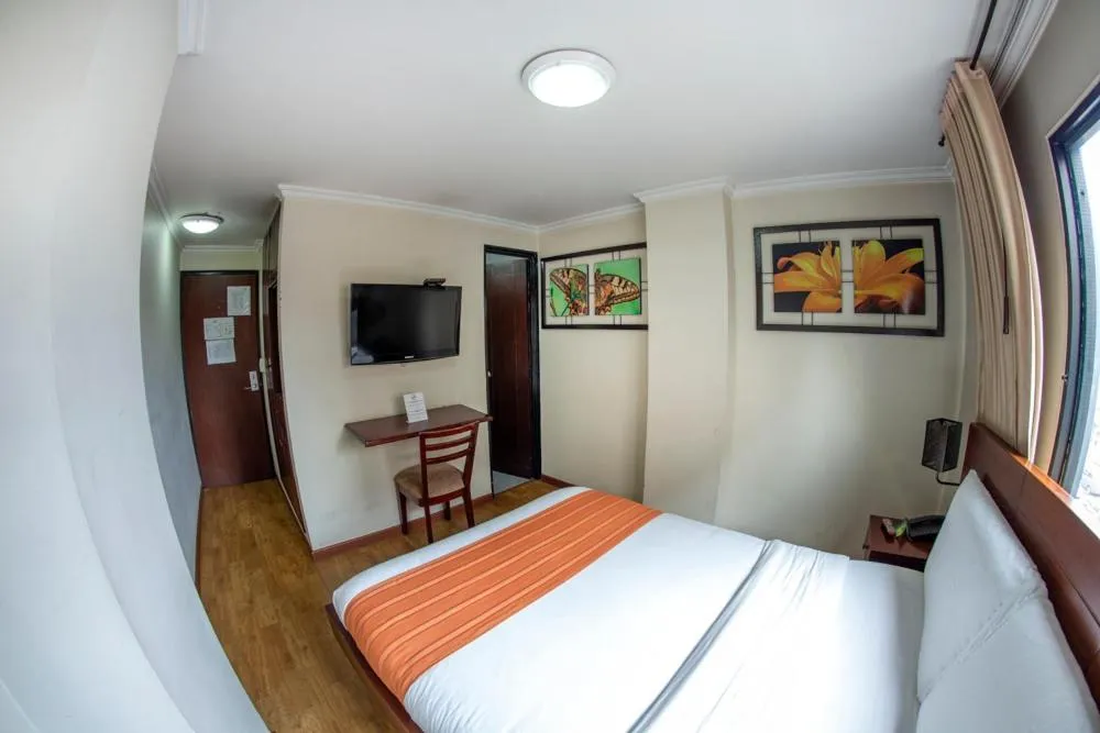 Bed in Hotel Splendor by Friends Company