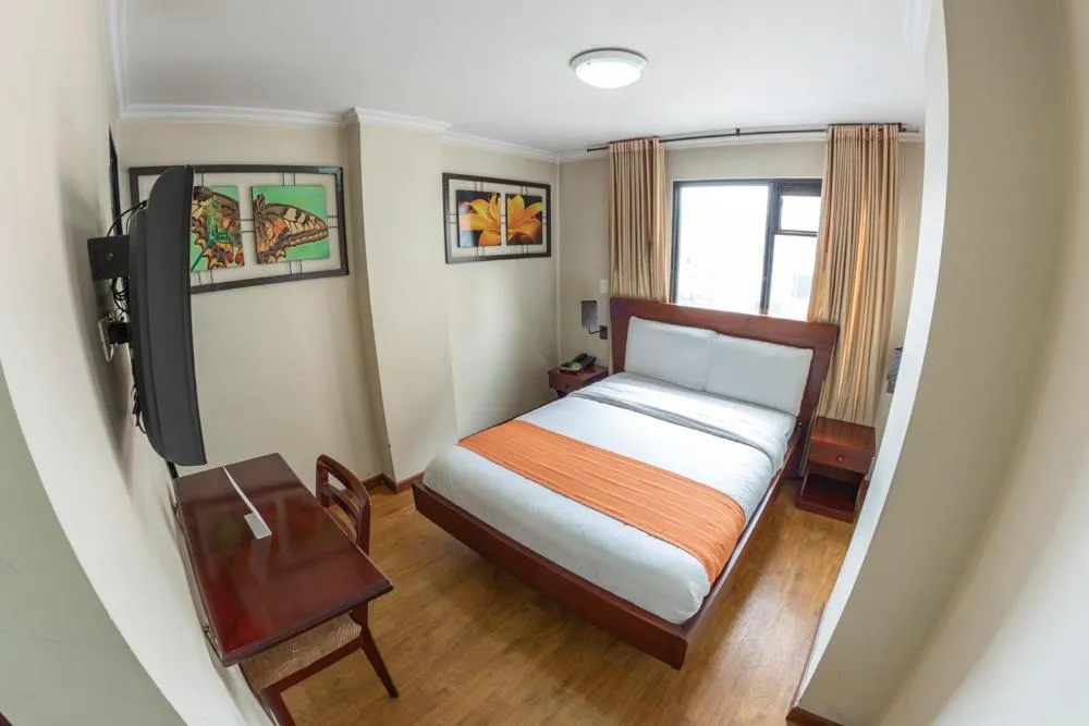 Bed in Hotel Splendor by Friends Company