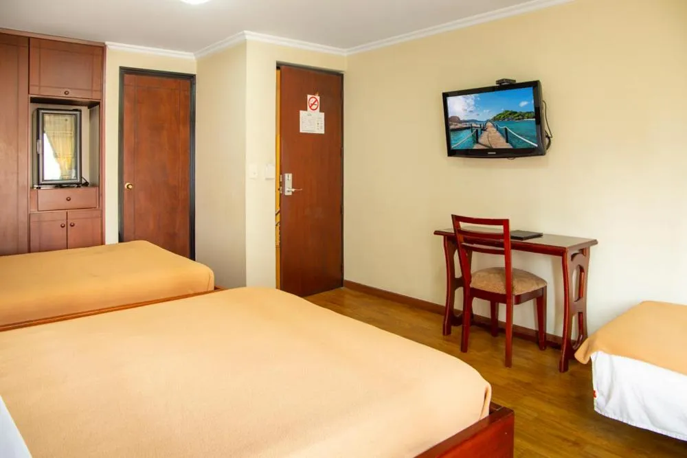 Bed in Hotel Splendor by Friends Company