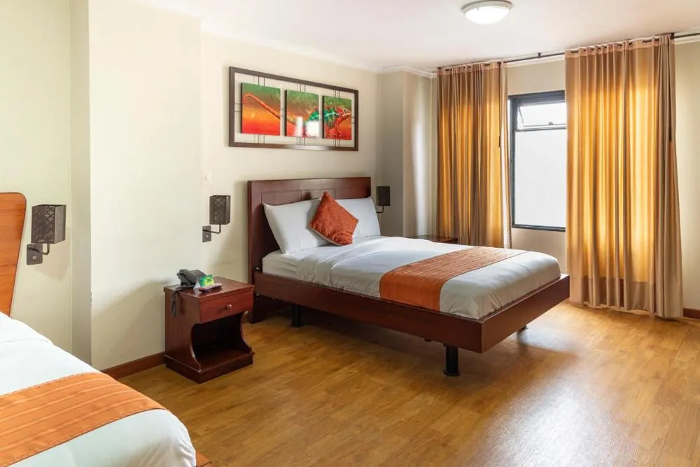 Bed in Hotel Splendor by Friends Company