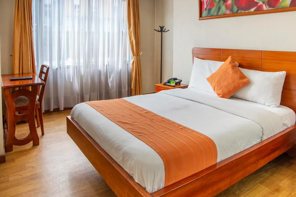 Bed in Hotel Splendor by Friends Company