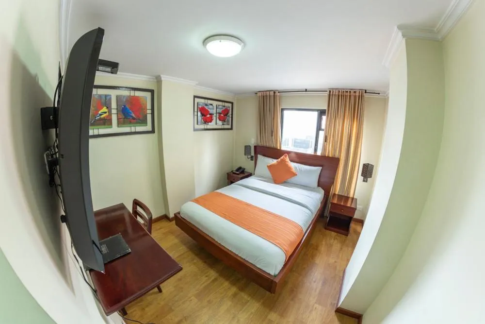 Bed in Hotel Splendor by Friends Company