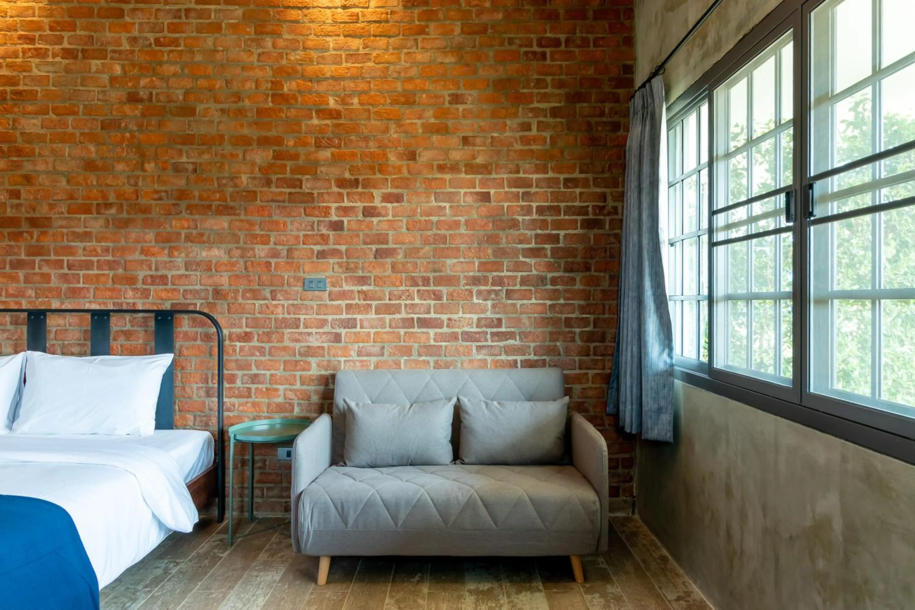 Seating area, Bed in The Barn Hua Hin