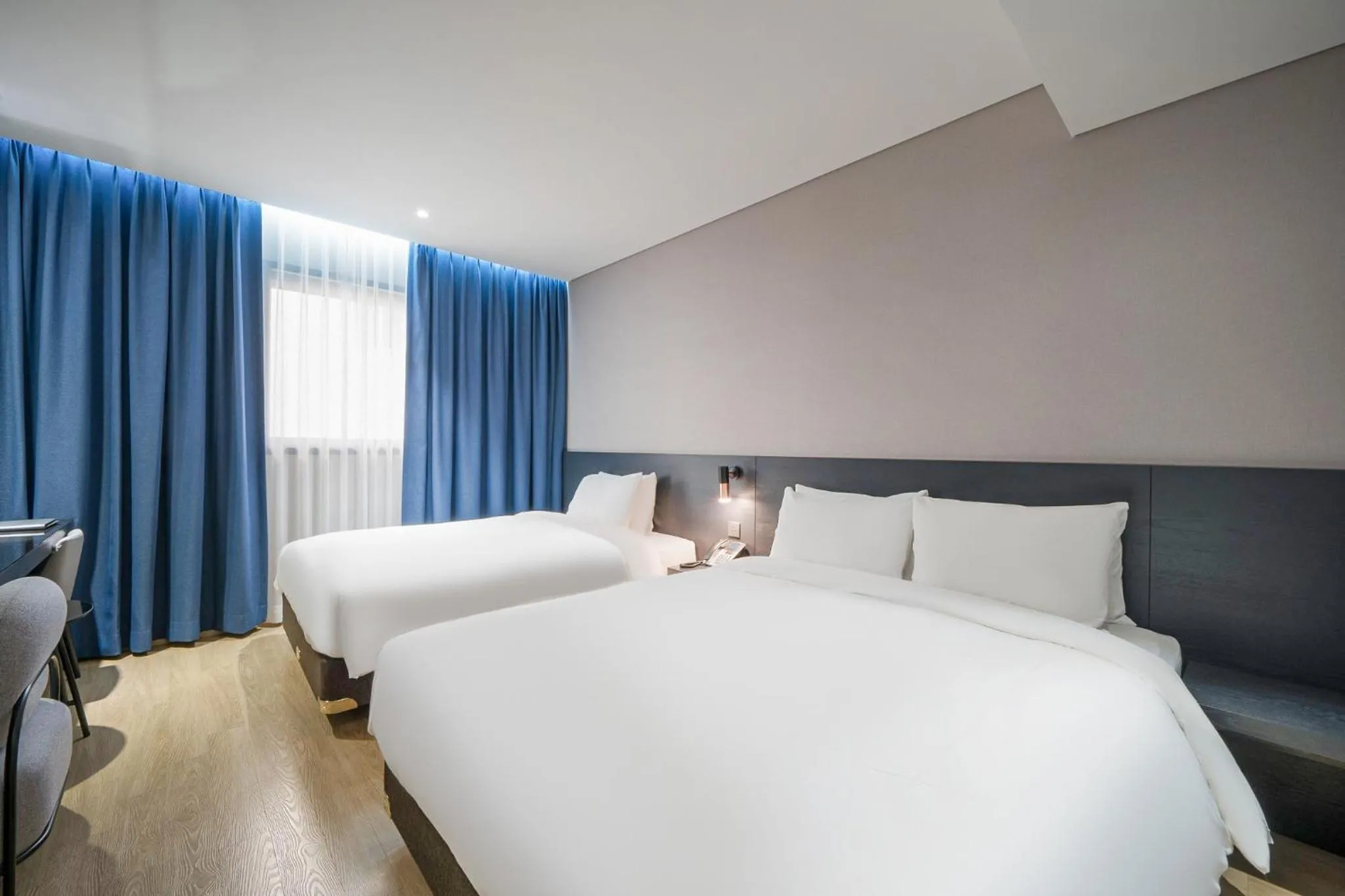 Bed in Rivertain Hotel Gyeongju
