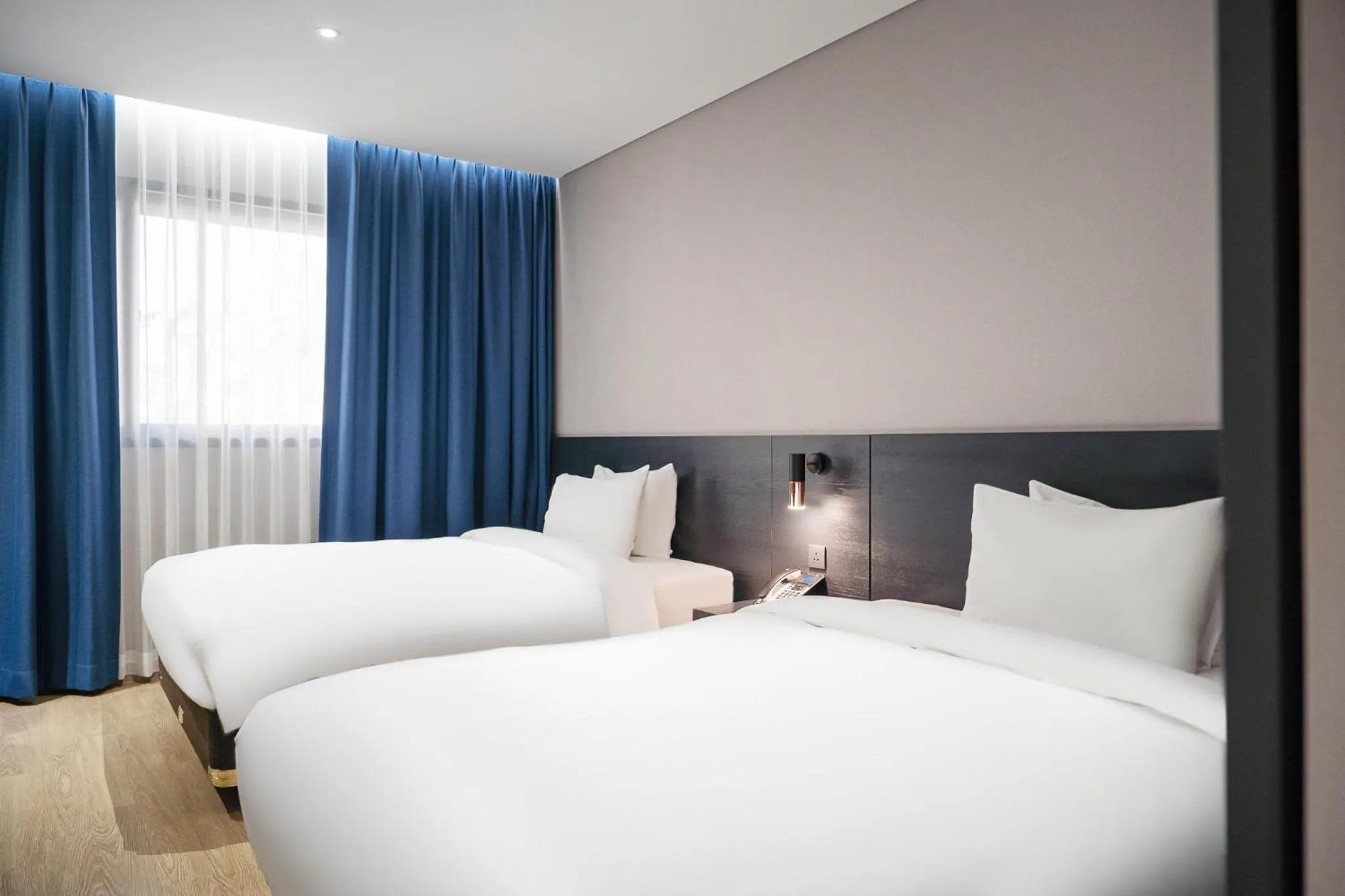 Bed in Rivertain Hotel Gyeongju