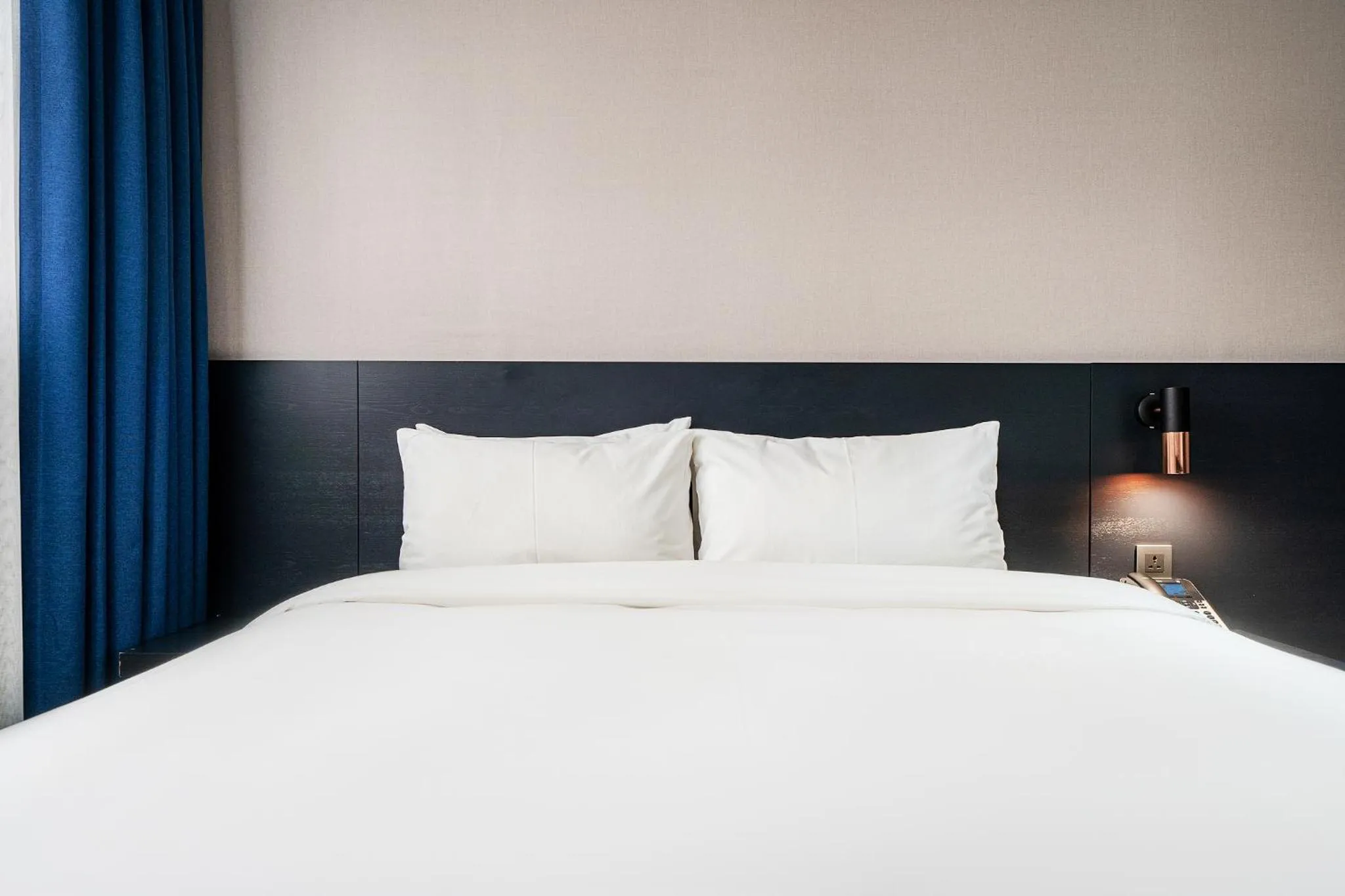 Bed in Rivertain Hotel Gyeongju