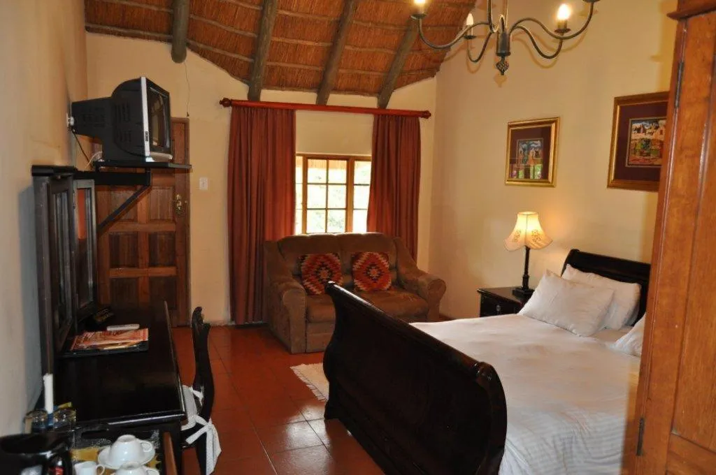 Bed in Blue Haze Country Lodge