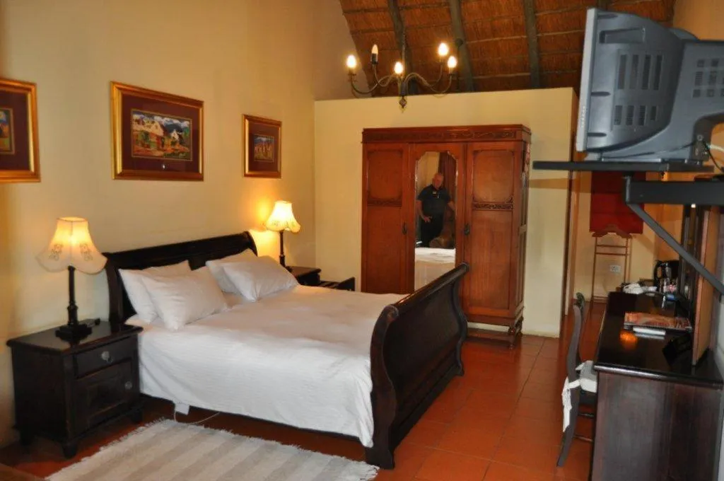 Bed in Blue Haze Country Lodge