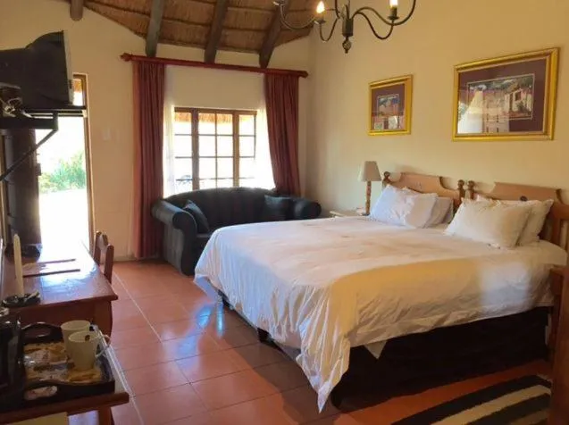 Bed in Blue Haze Country Lodge