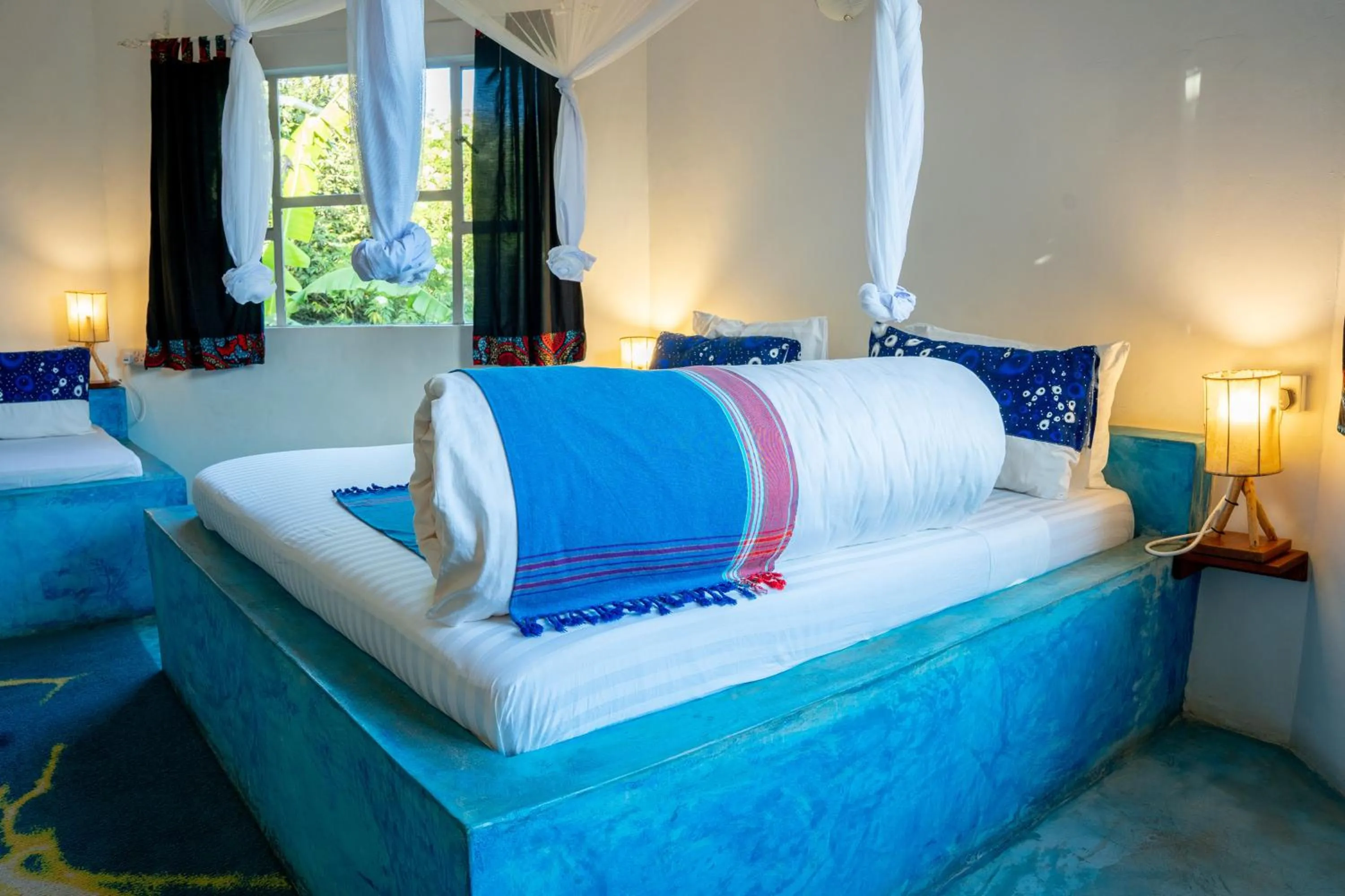 Bed in Dan Stam Hotel