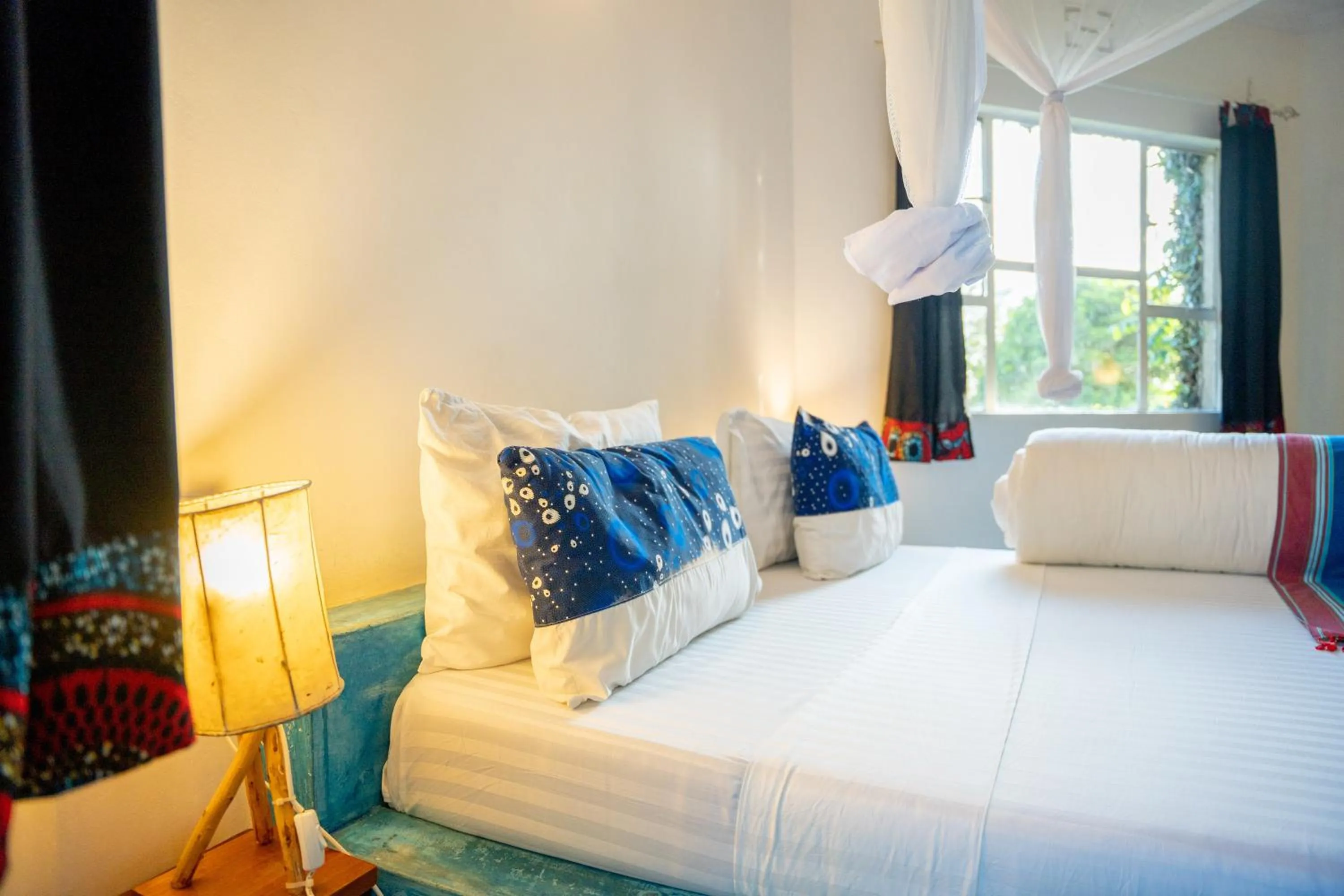 Bed in Dan Stam Hotel