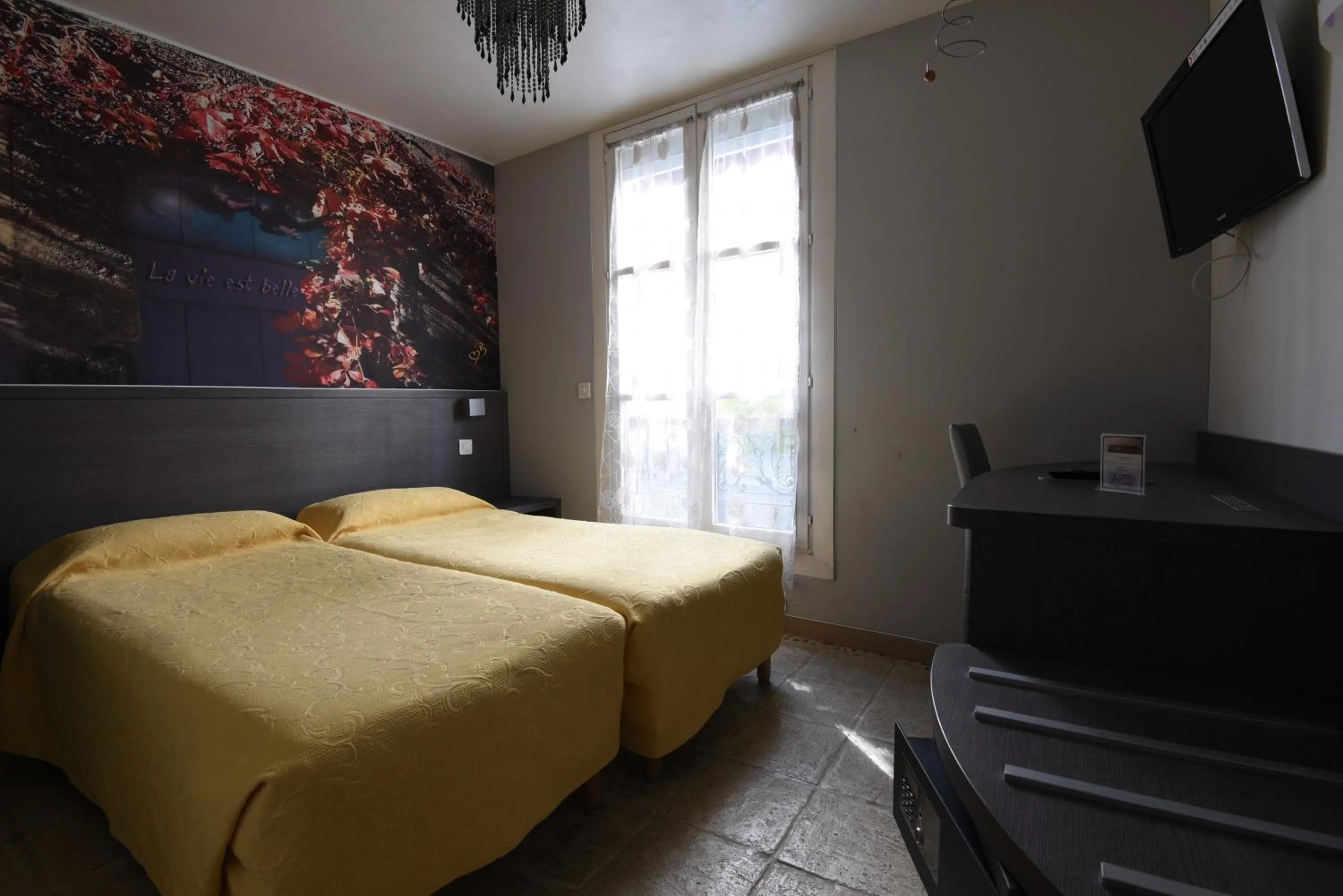 Bed in Amélie Hotel