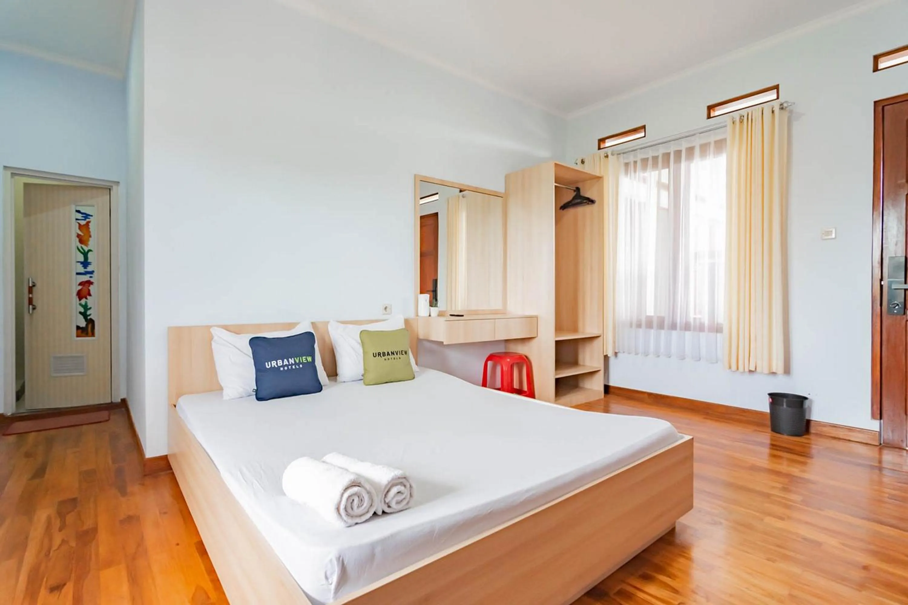 Photo of the whole room, Bed in Urbanview Hotel One Family Maribaya by RedDoorz