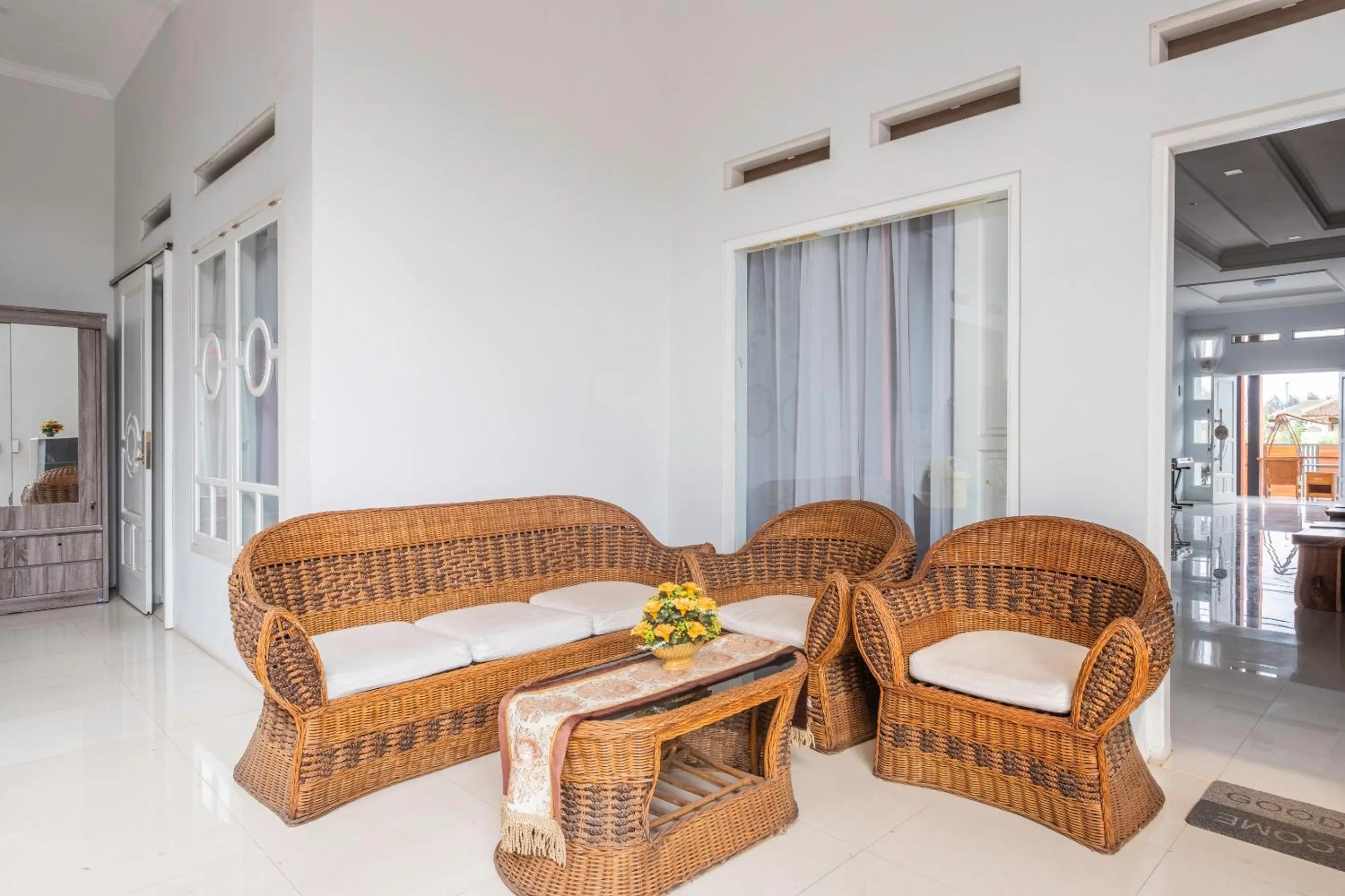 Seating area in Urbanview Hotel One Family Maribaya by RedDoorz