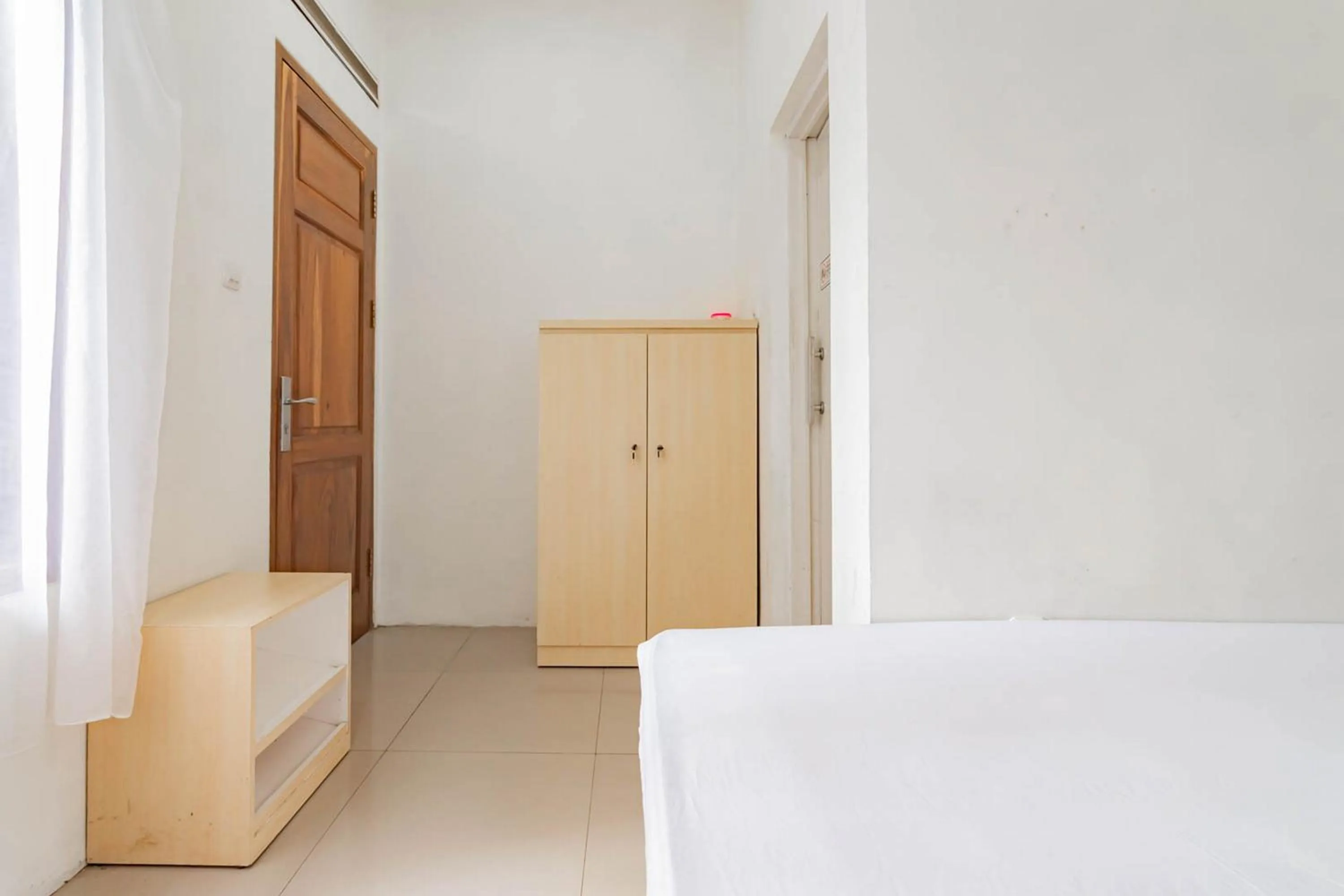 Bedroom, Bed in Urbanview Hotel One Family Maribaya by RedDoorz