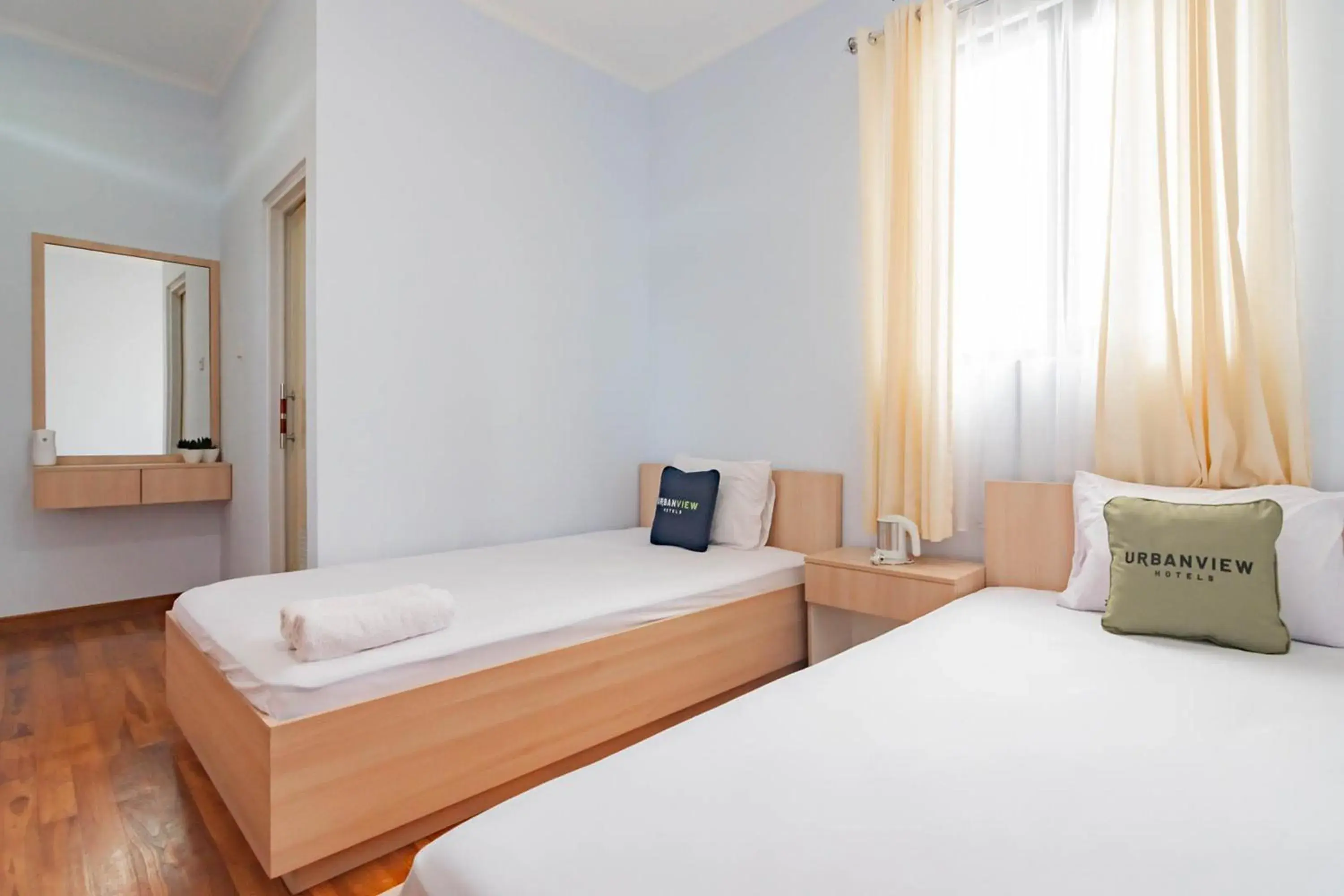 Superior Twin Room in Urbanview Hotel One Family Maribaya by RedDoorz Superior Twin Room in Urbanview Hotel One Family Maribaya by RedDoorz