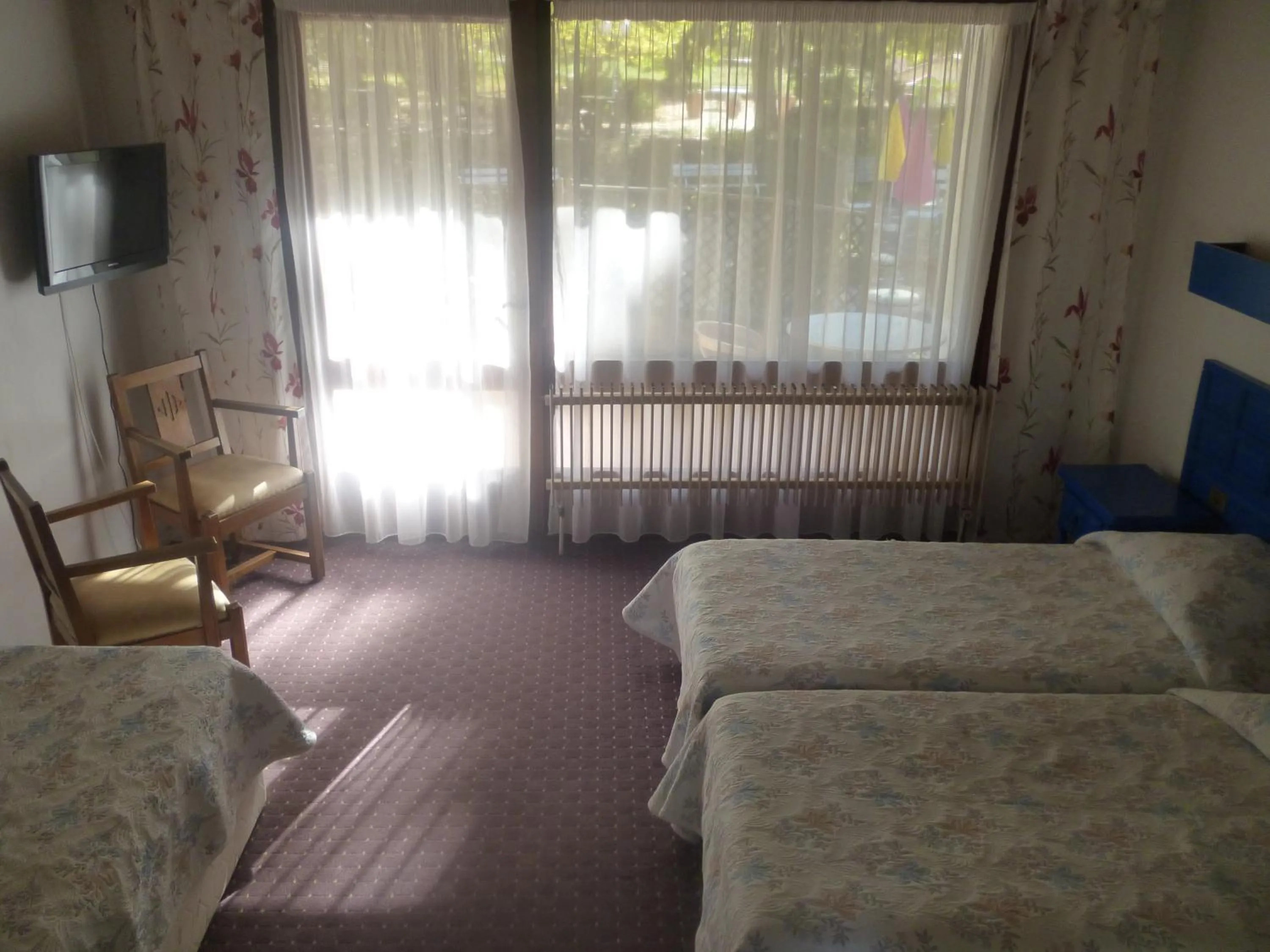 Bed in Hotel Le Mas Fleuri