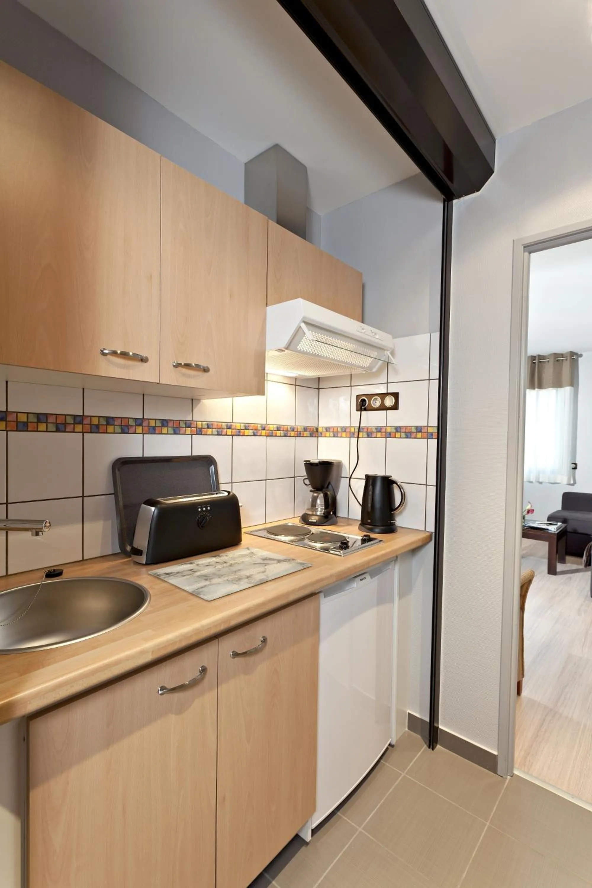 Kitchen or kitchenette in Logis Cottage Hotel