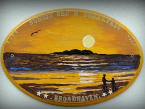 Property logo or sign in Sunset Bed and Breakfast