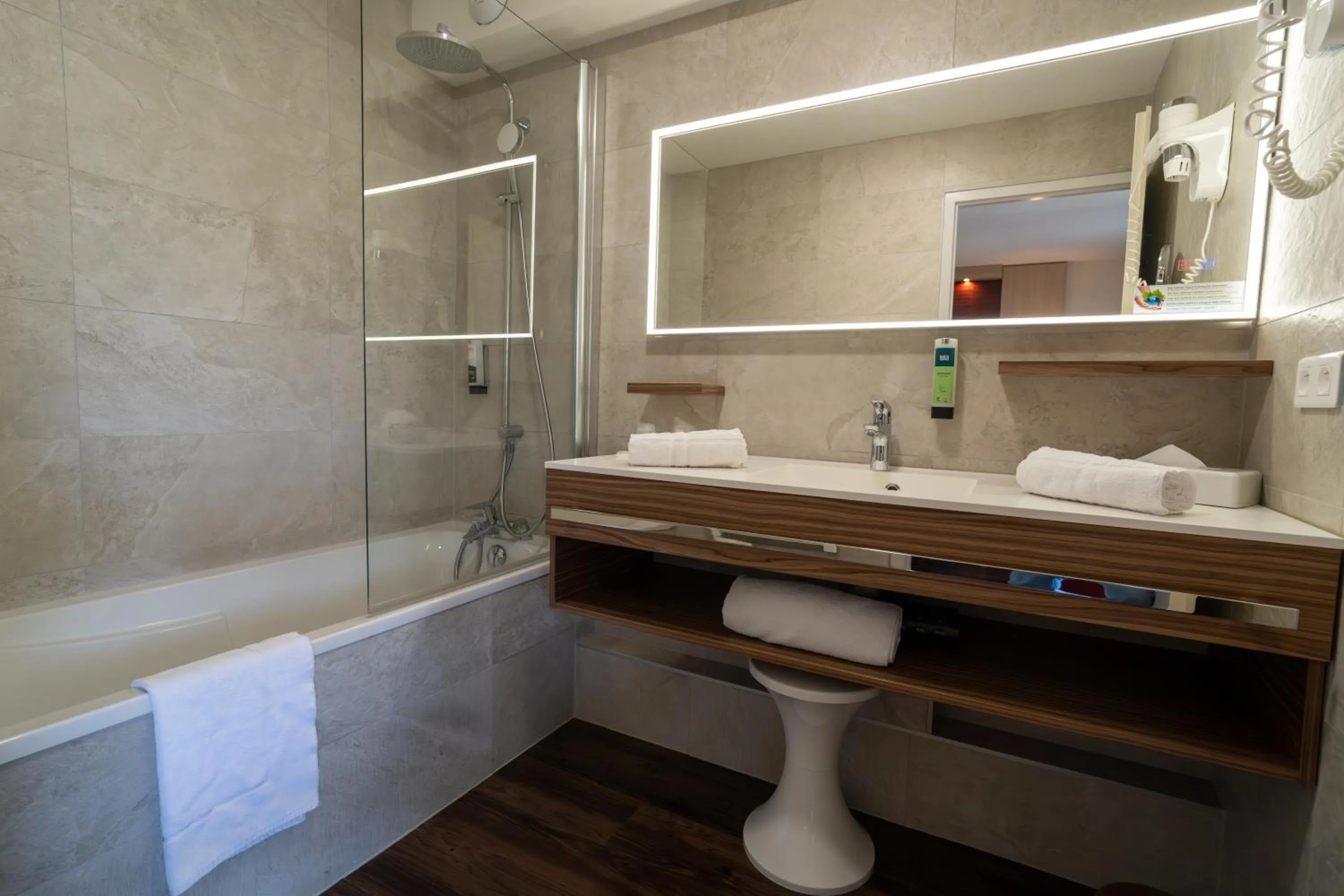 Bathroom in Logis Hotel Arc En Ciel