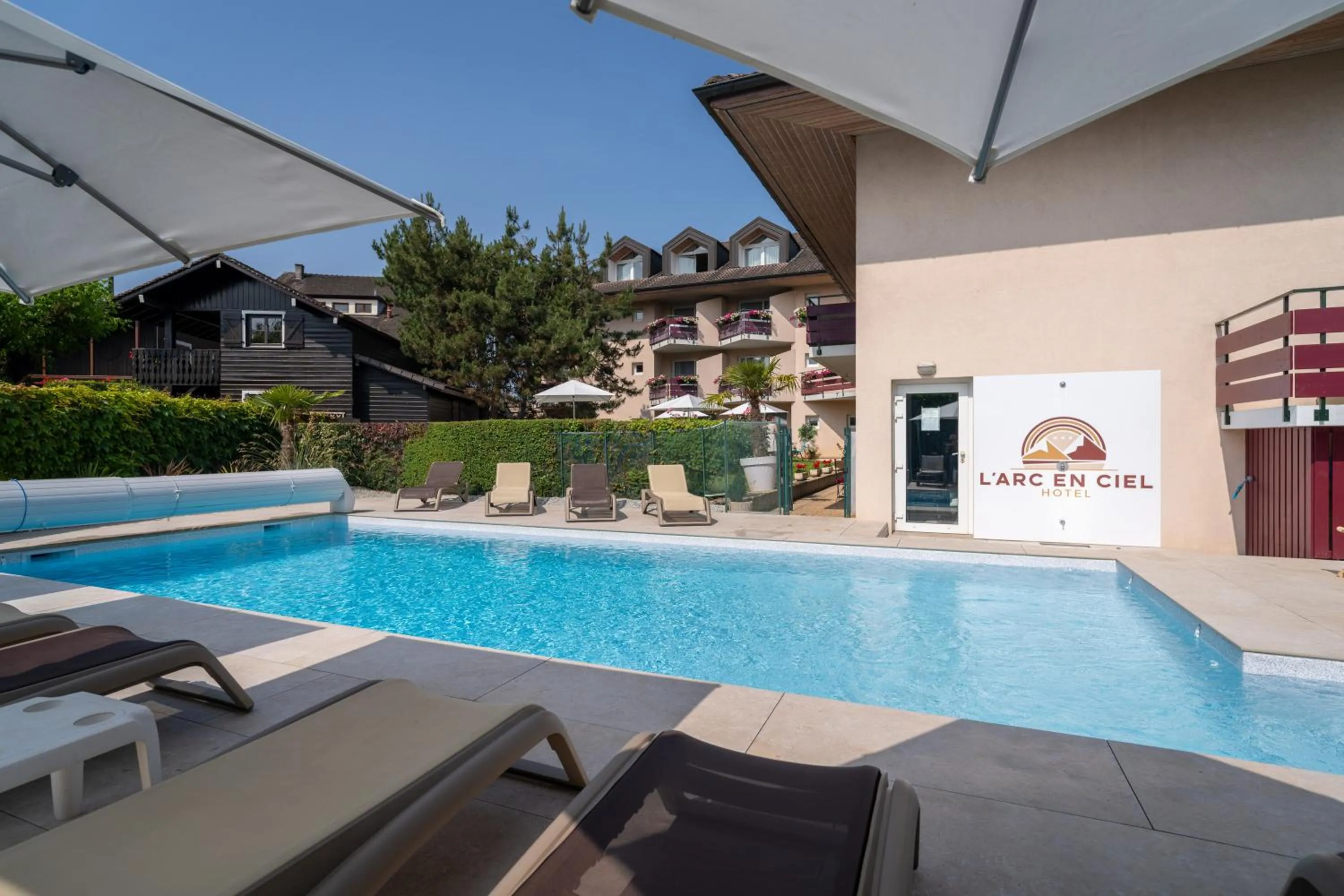 Property building in Logis Hotel Arc En Ciel