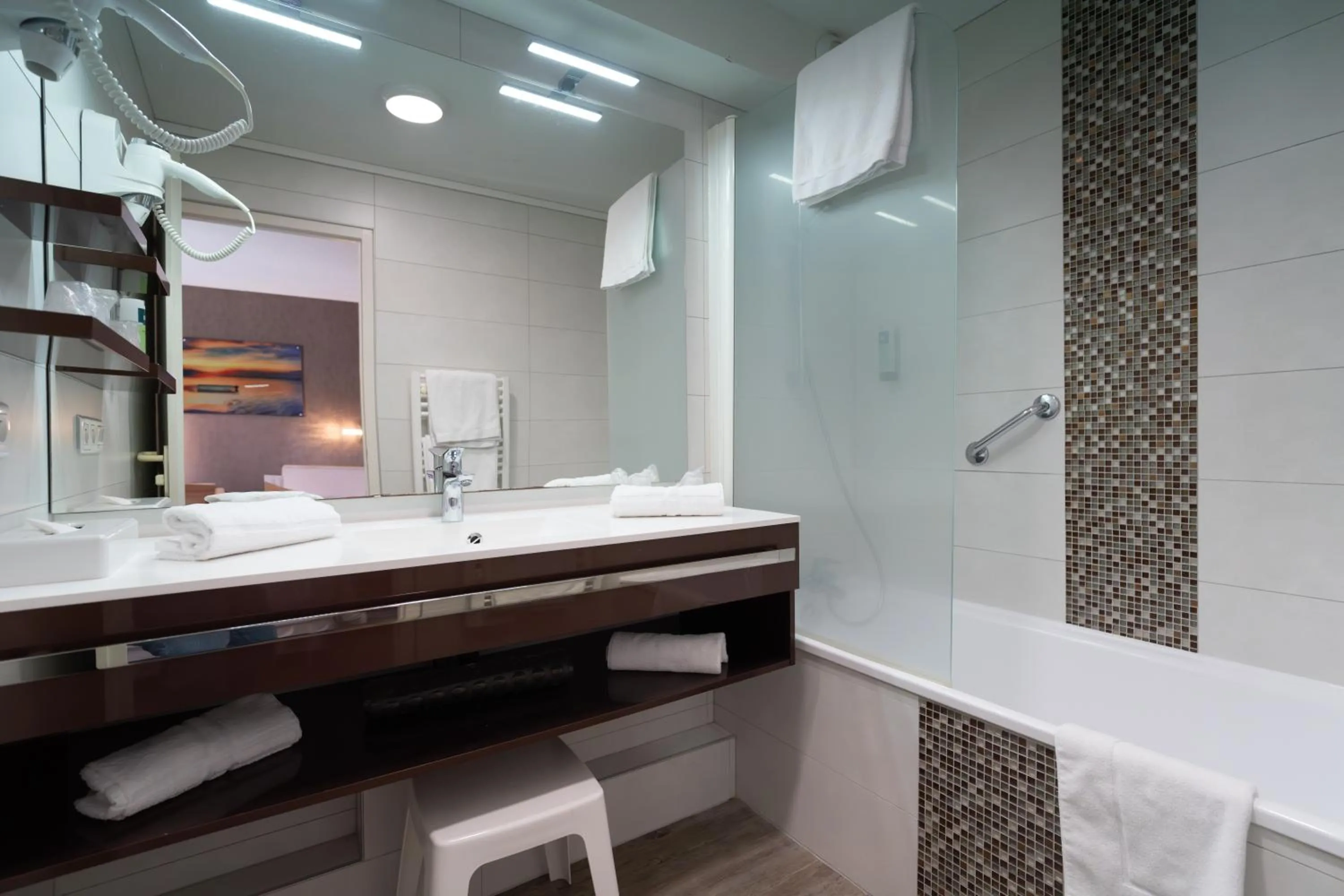 Bathroom in Logis Hotel Arc En Ciel