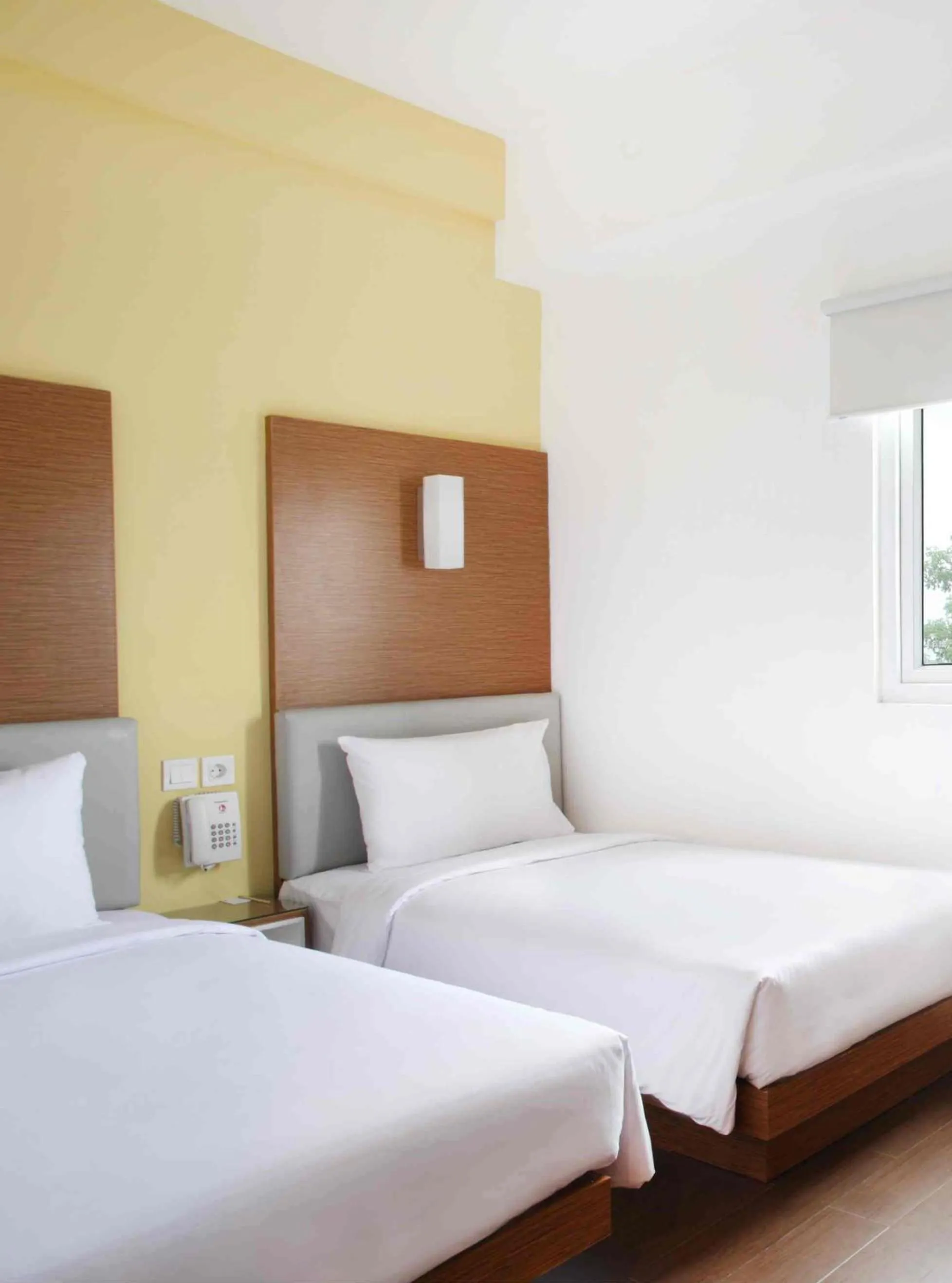 Bed in Amaris Hotel Pratama Nusa Dua