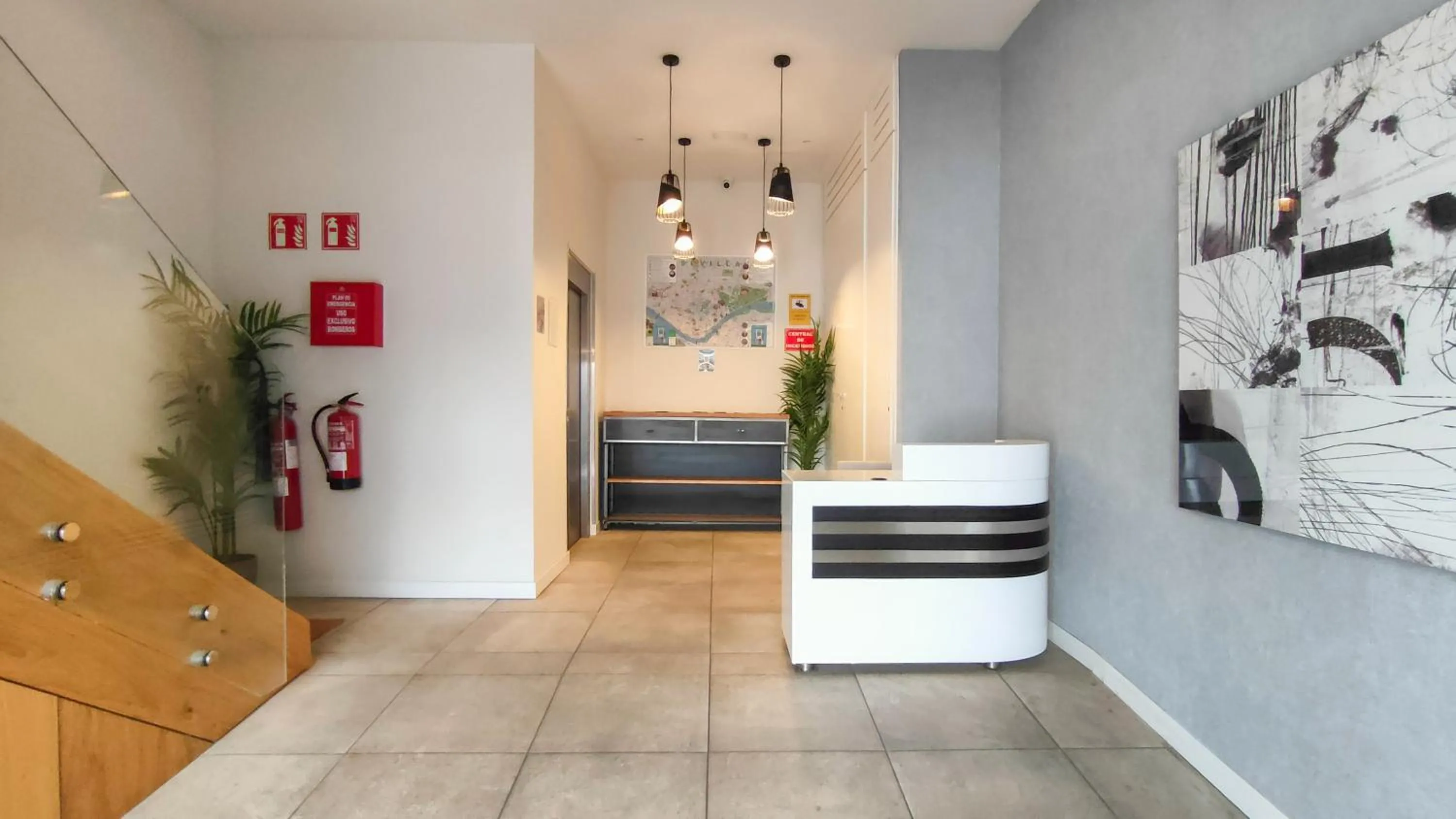 Lobby or reception in Apartamentos Magna Sevilla