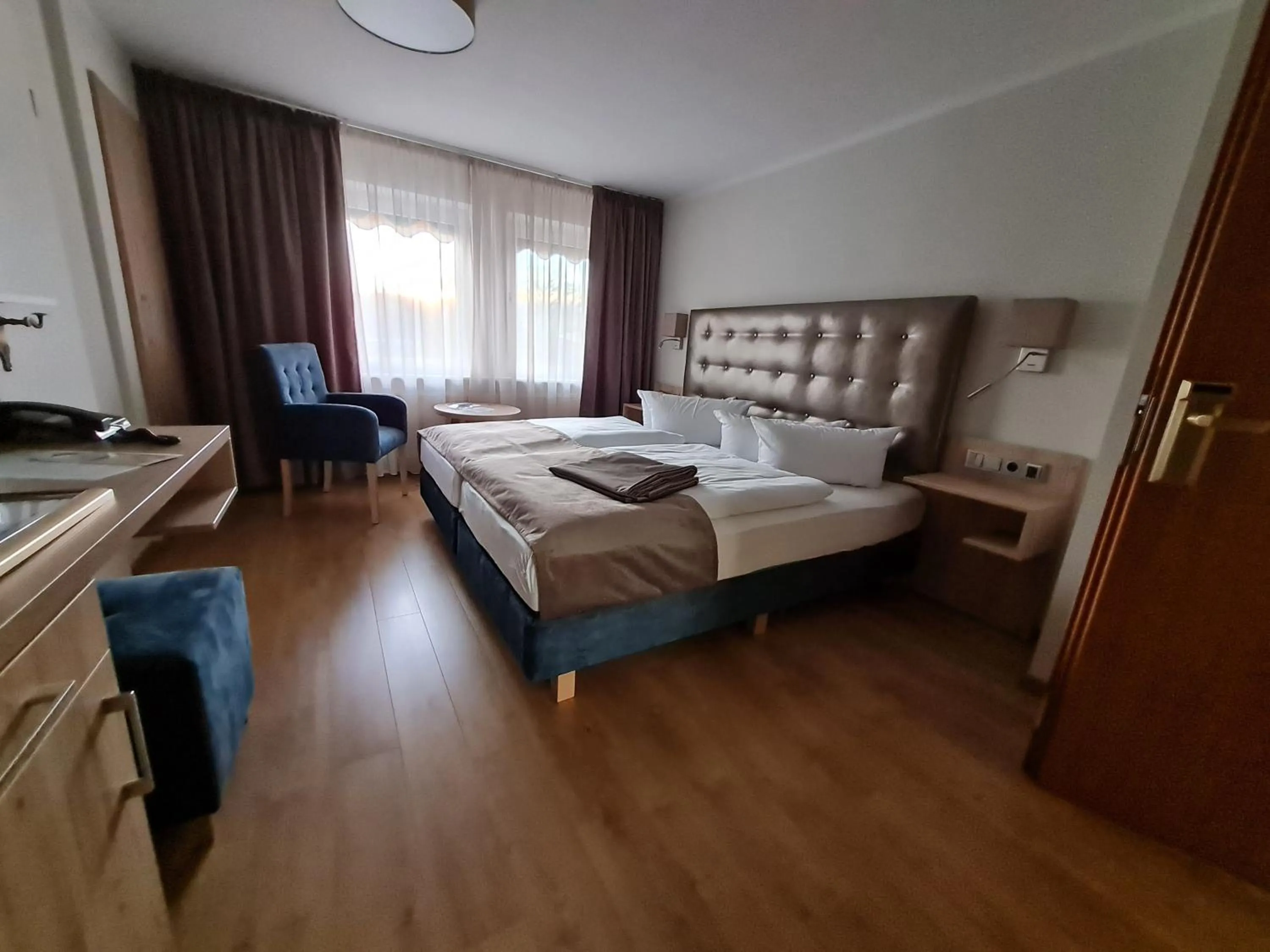Photo of the whole room, Bed in Seehotel Fährhaus