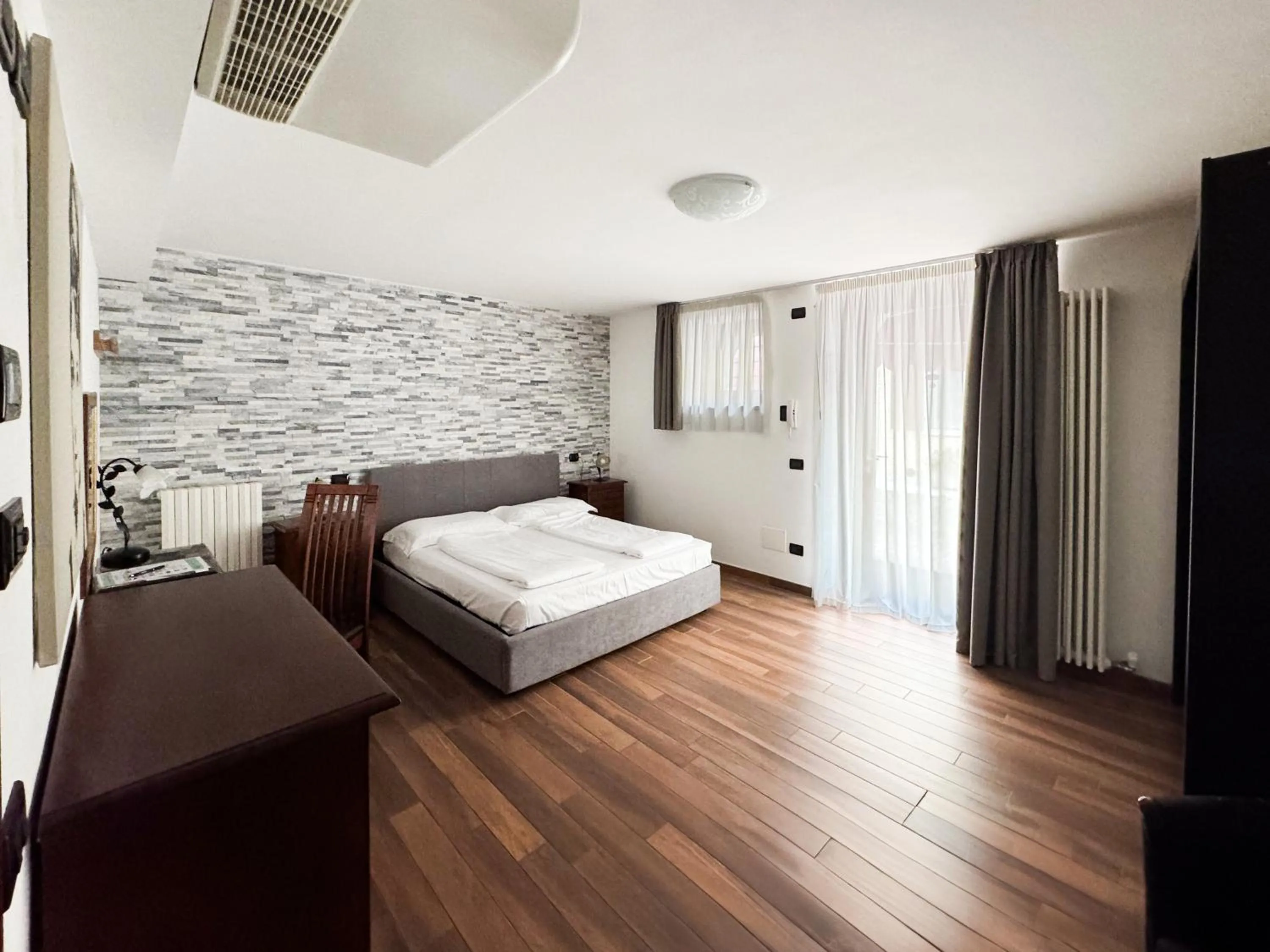 Bed in Apartments Colombara Bardolino