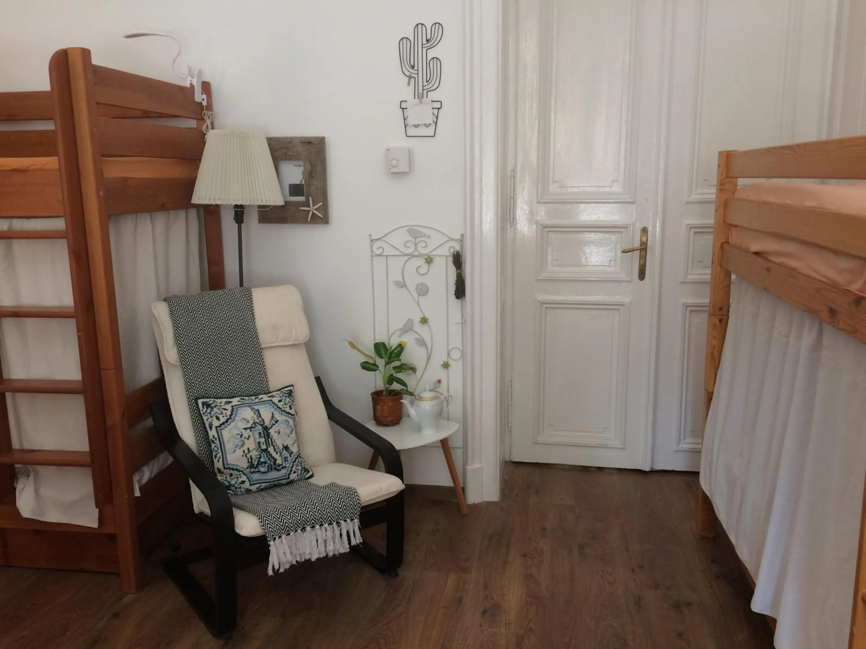 Seating area, Bed in Zen Hostel by Central Market