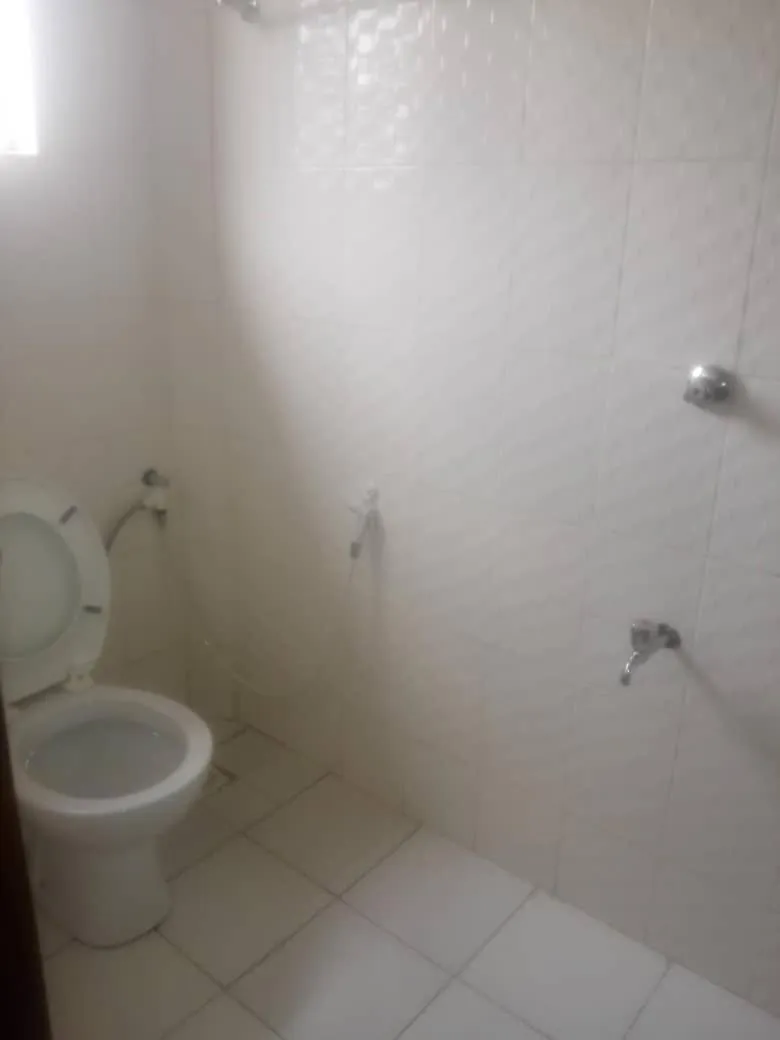 Toilet in Coffee Tourist Motel