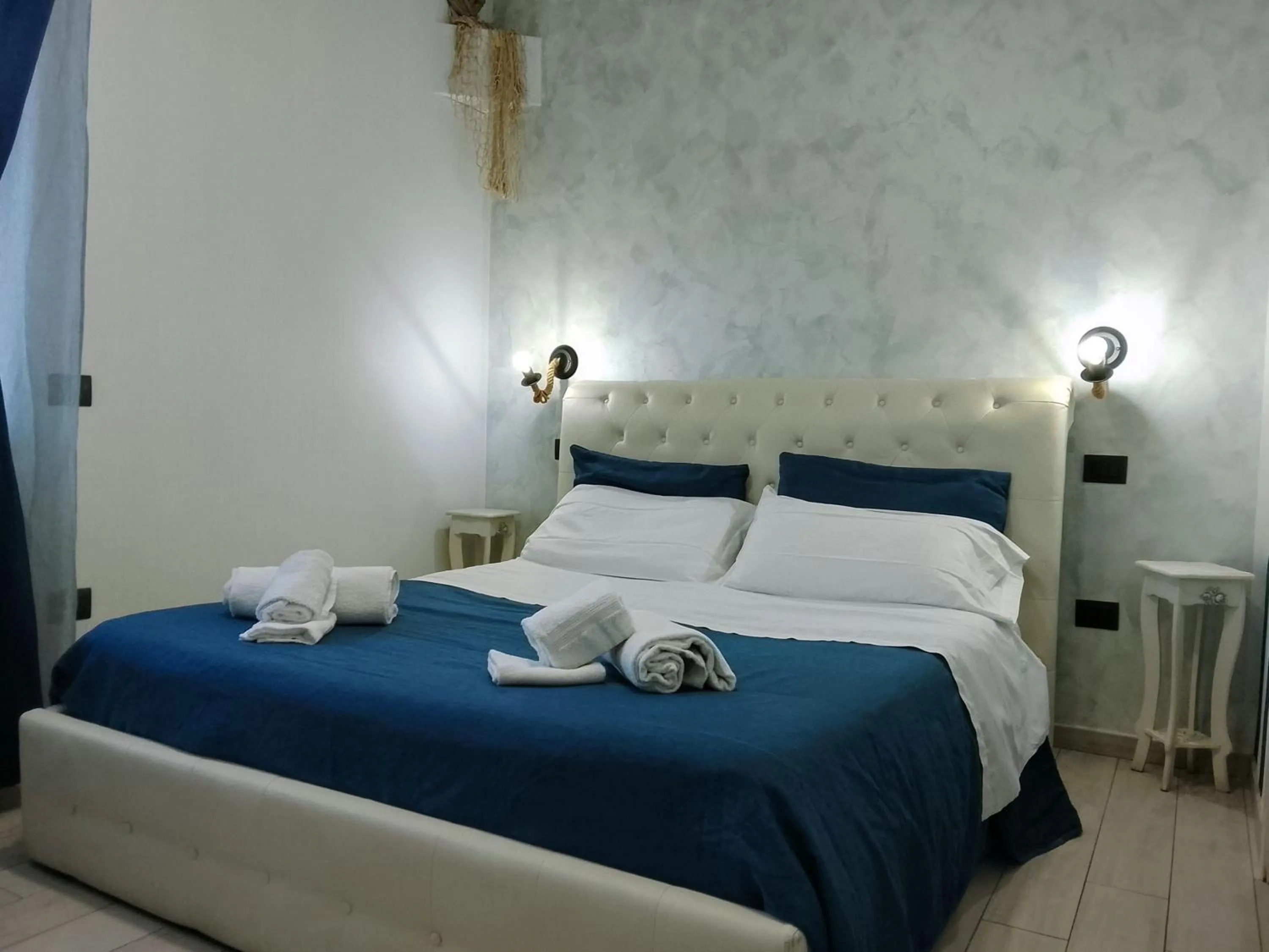 Bed in Domus Michaeli B&B Pompei perfetto per famiglie e gruppi Camere confortevoli vicino agli Scavi e al centro