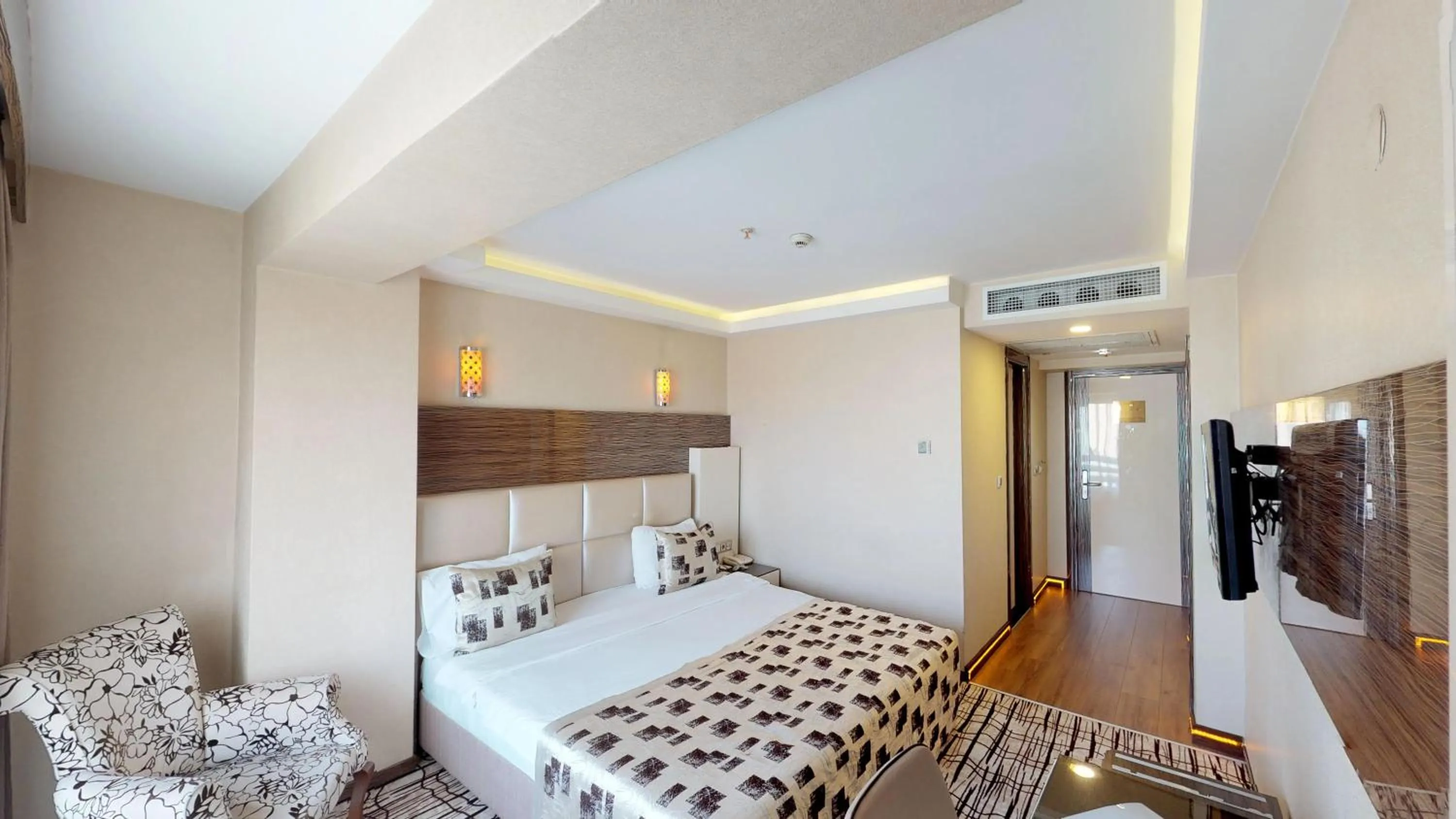 Bed in Green Prusa Hotel