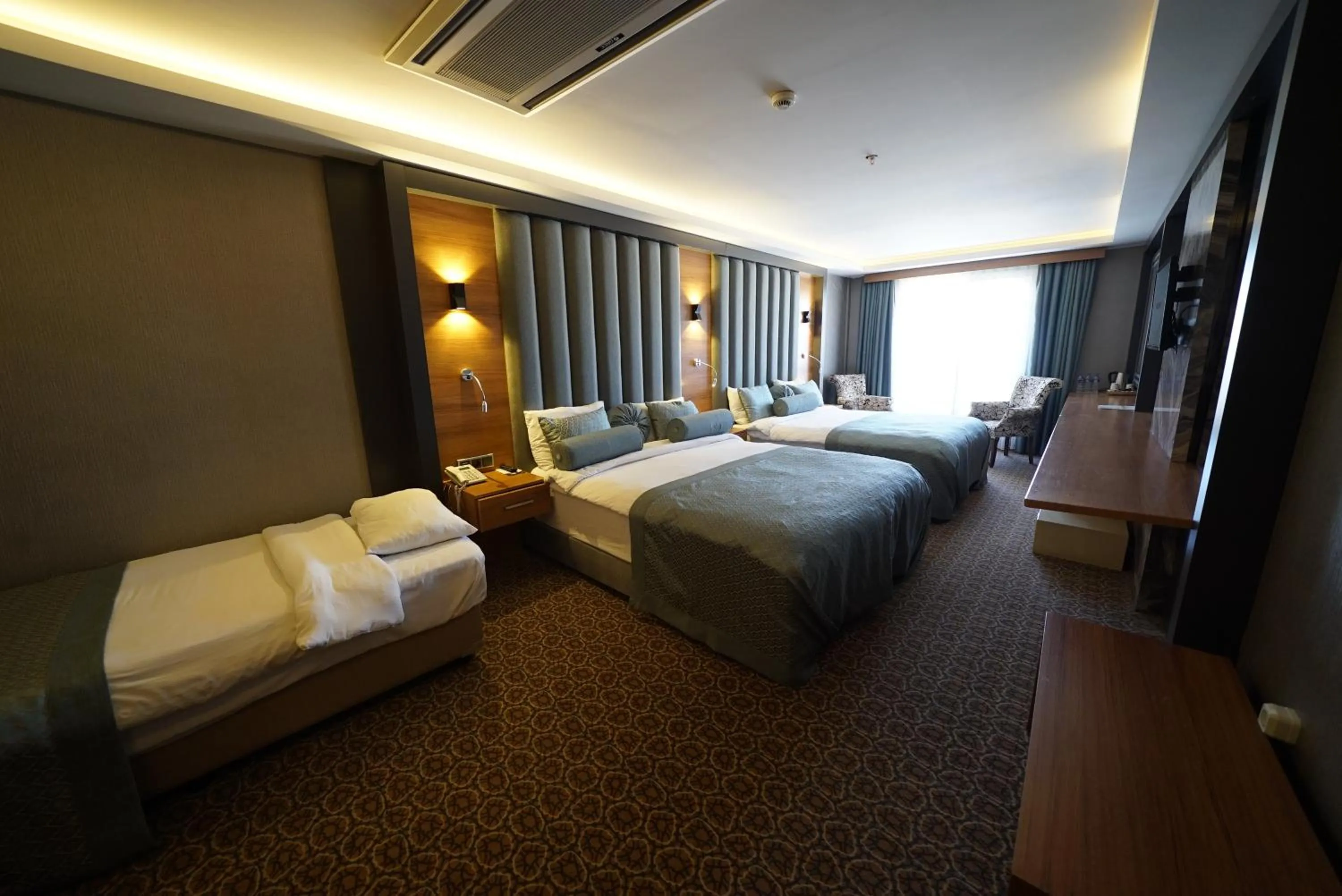 Bed in Green Prusa Hotel