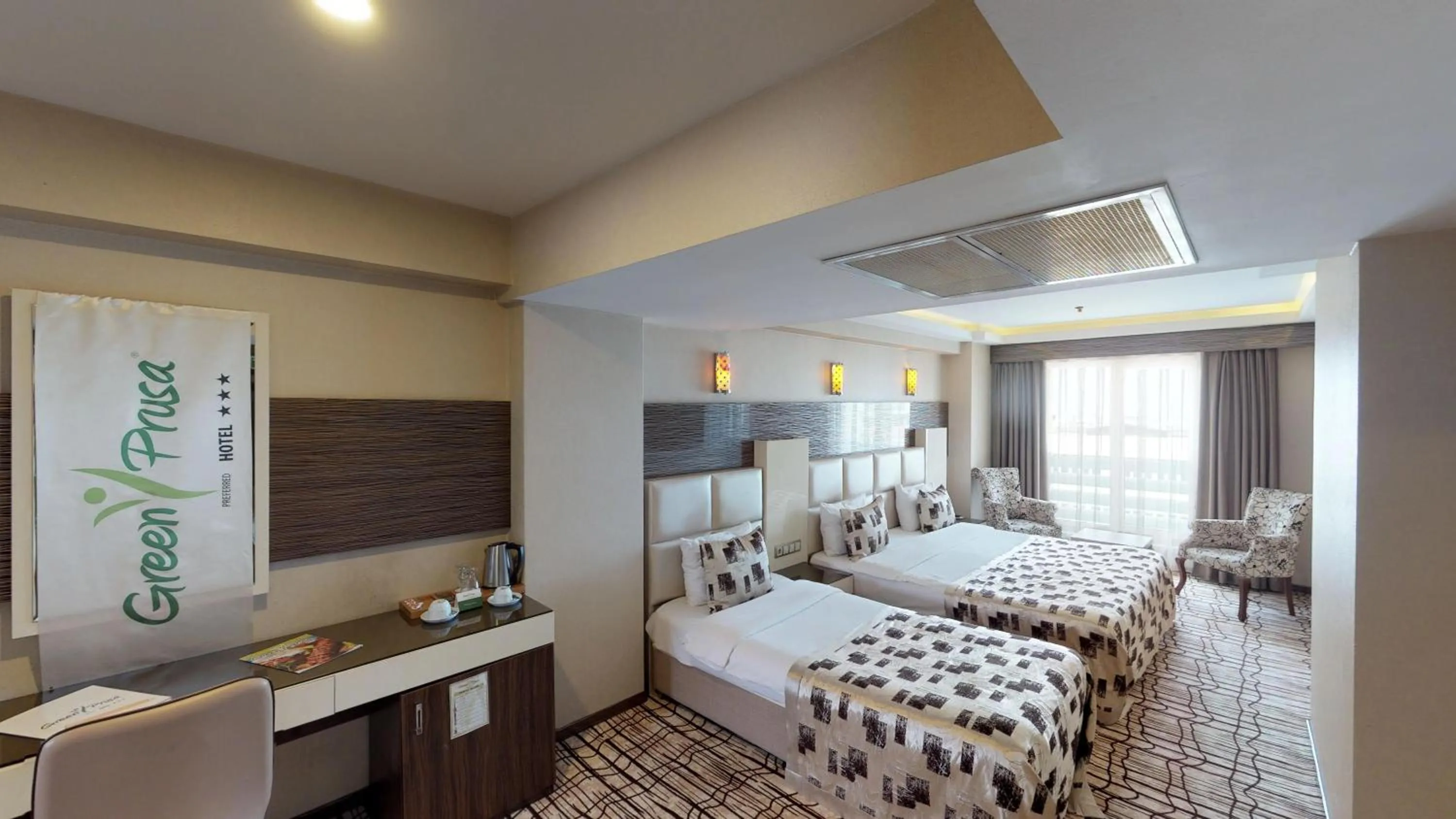 Bed in Green Prusa Hotel