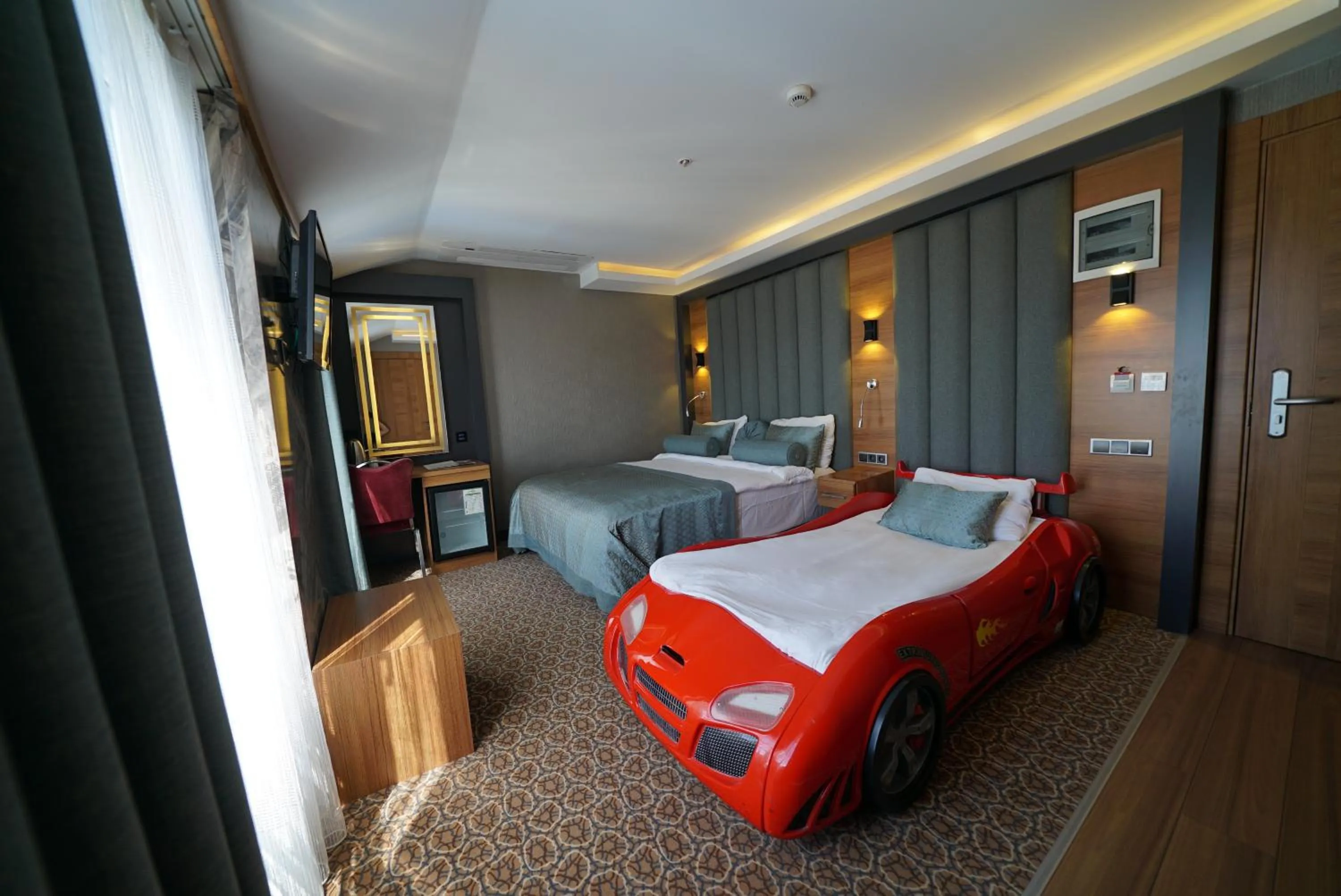 Bed in Green Prusa Hotel