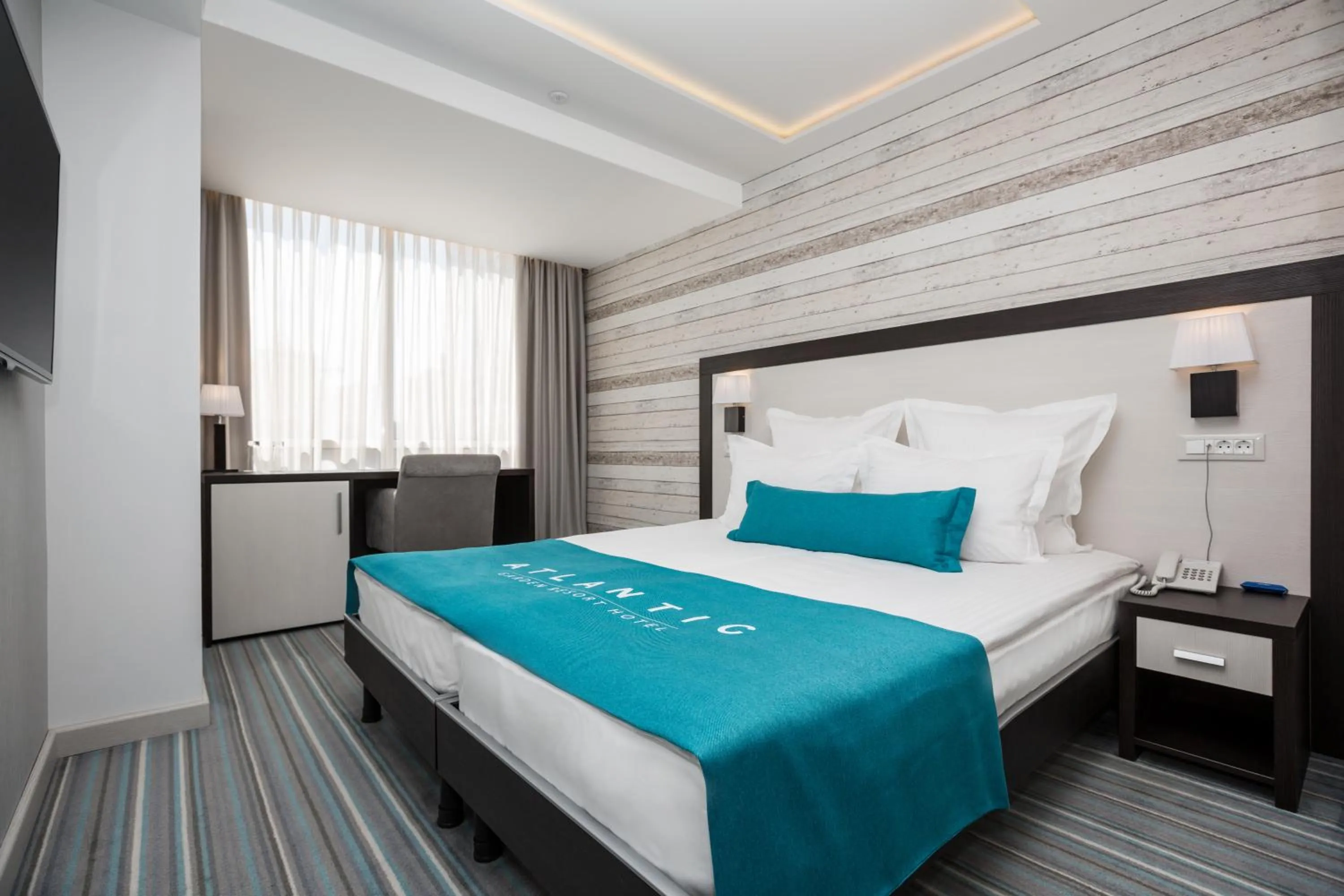 Bed in Atlantic Garden Resort