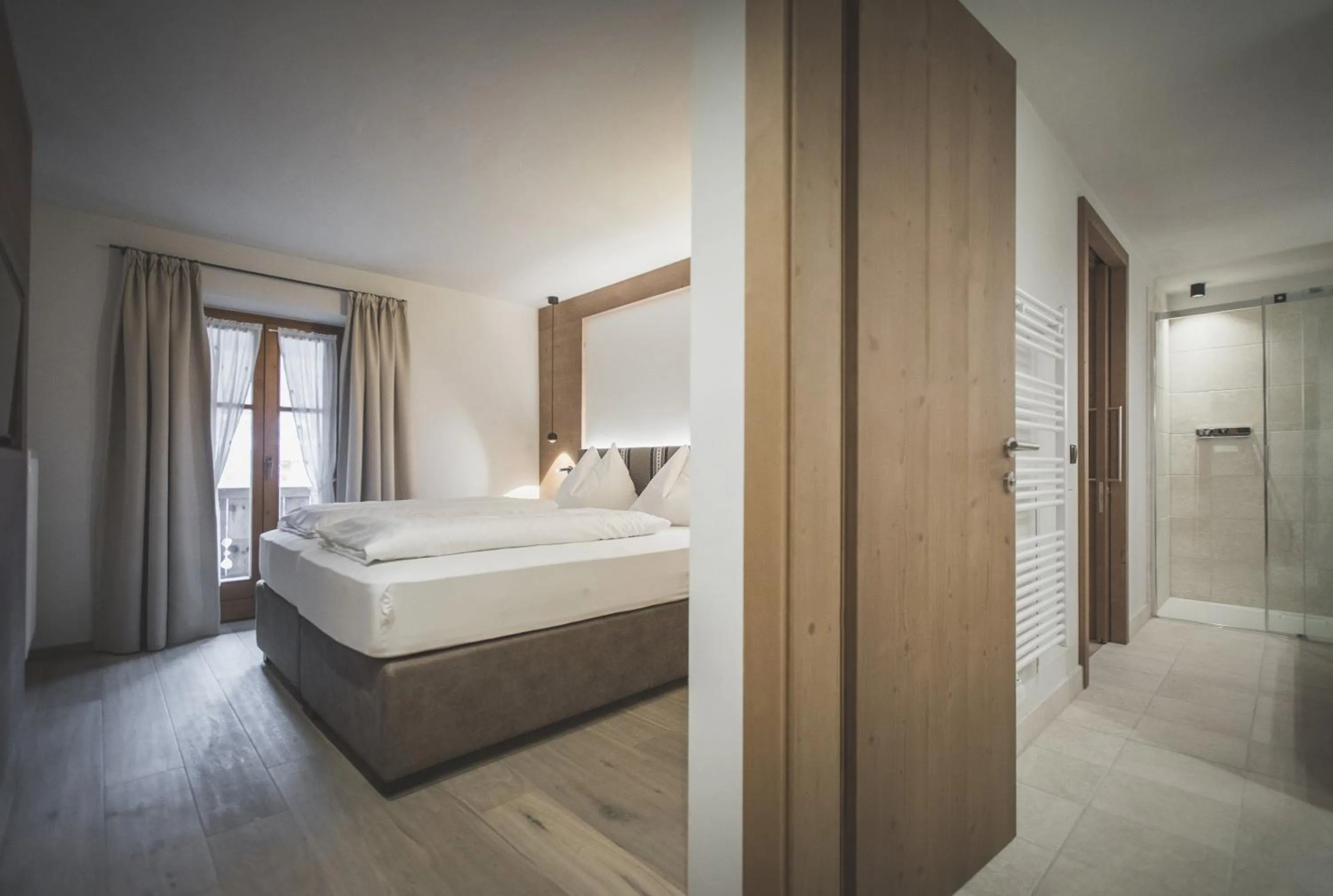 Bed in Hotel Alpenhof