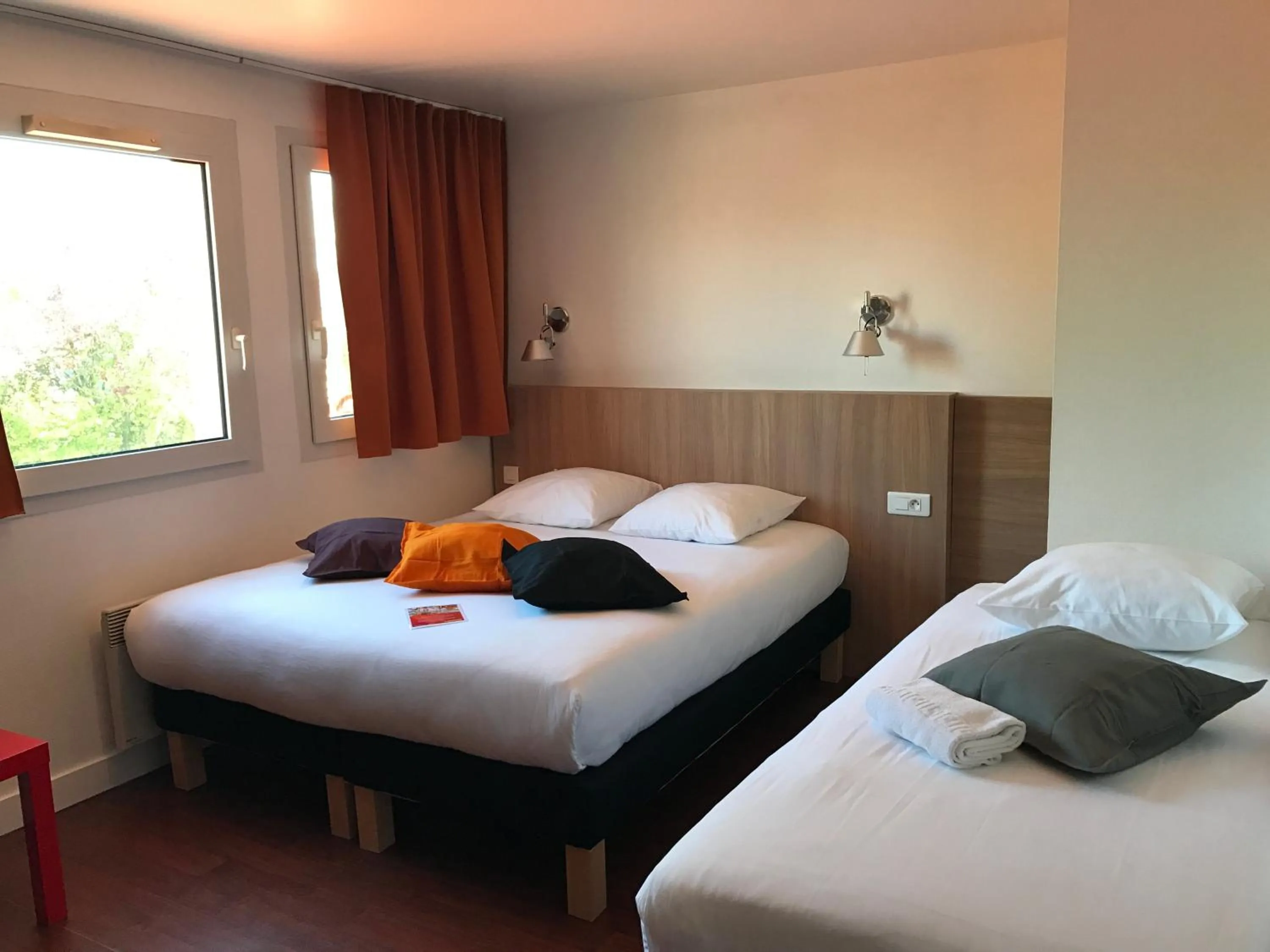 Decorative detail, Bed in Kyriad Direct Agen