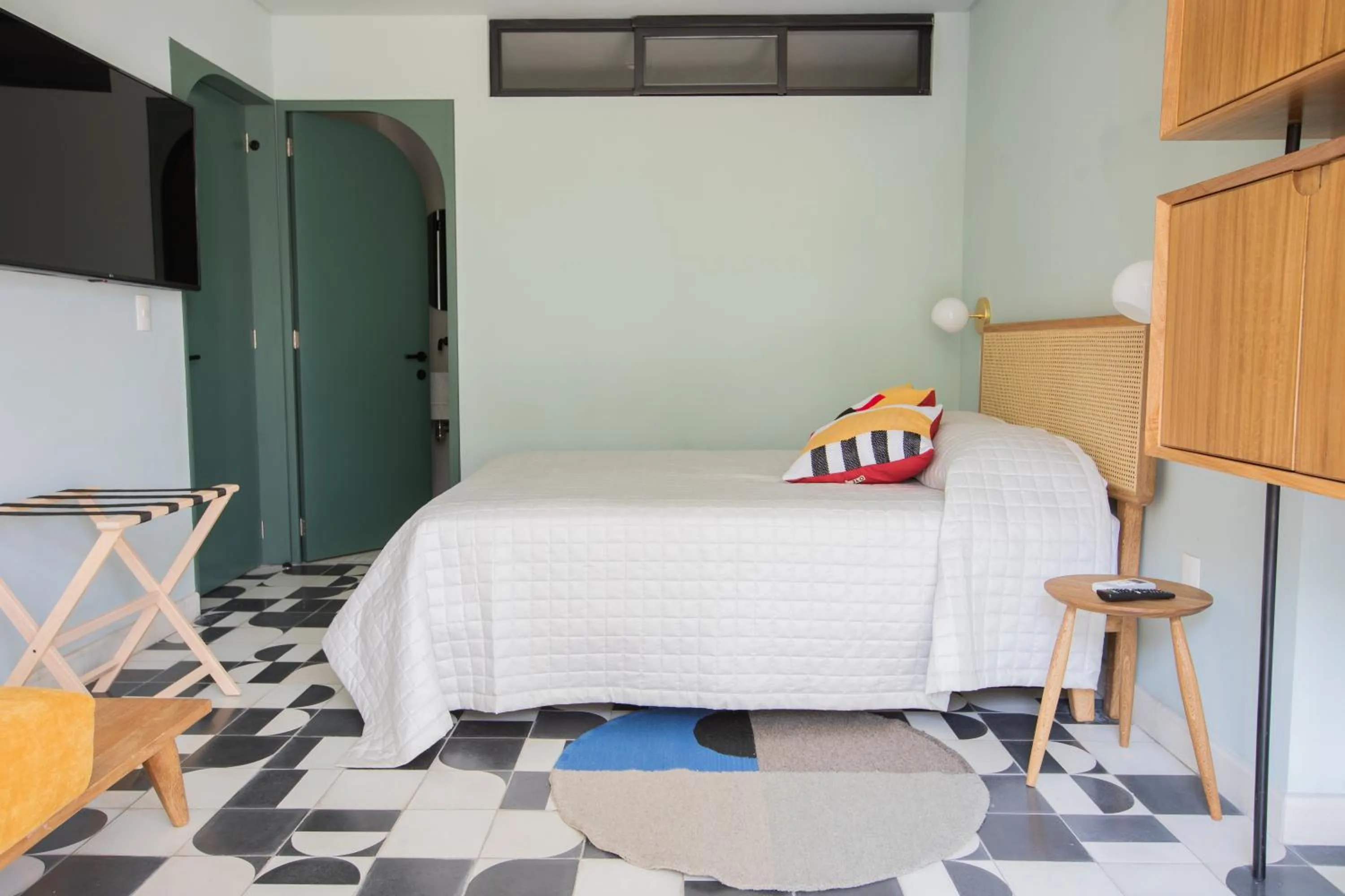 Bed in Casa Ixaya by Barrio México