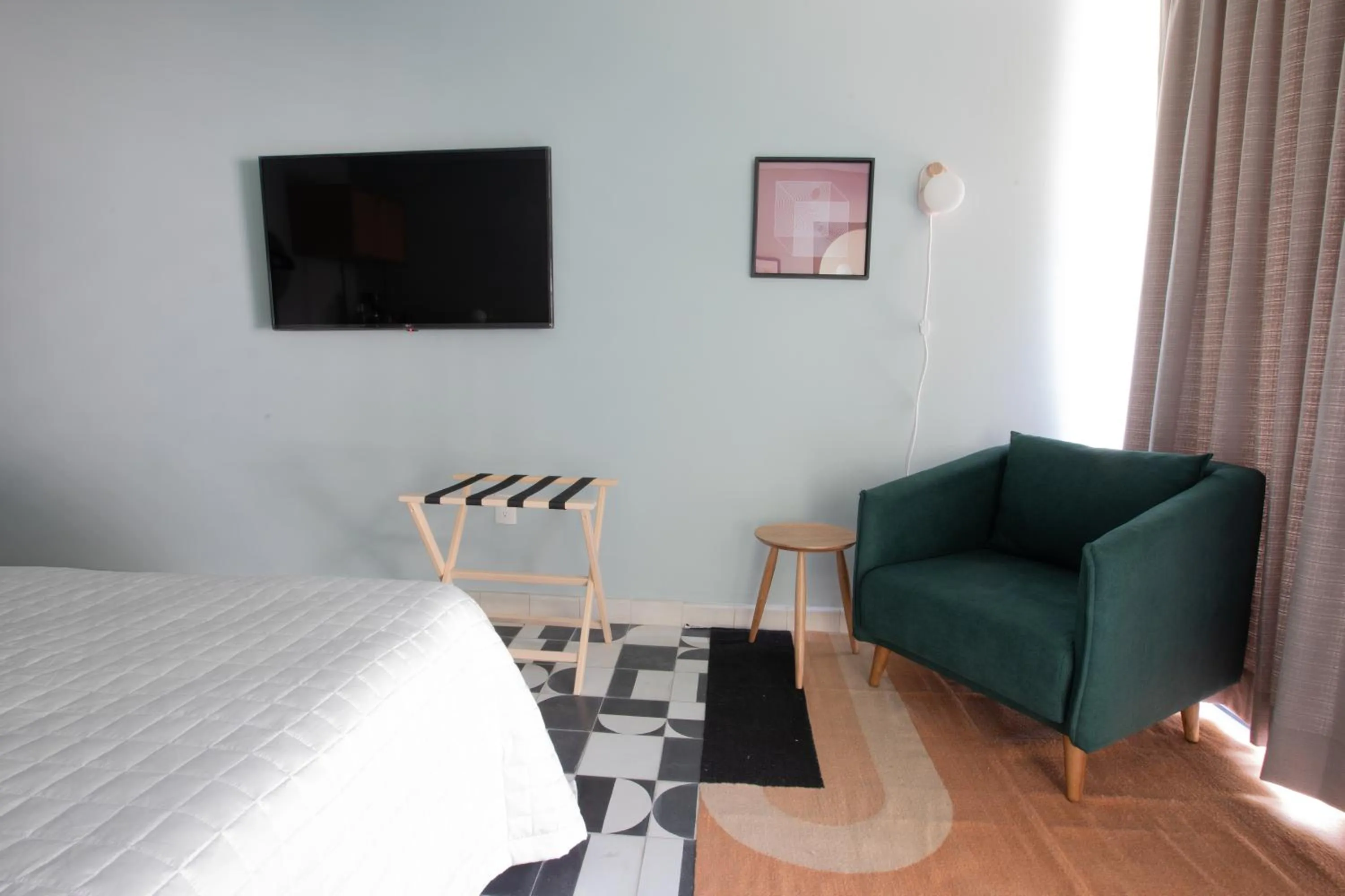 Bed in Casa Ixaya by Barrio México