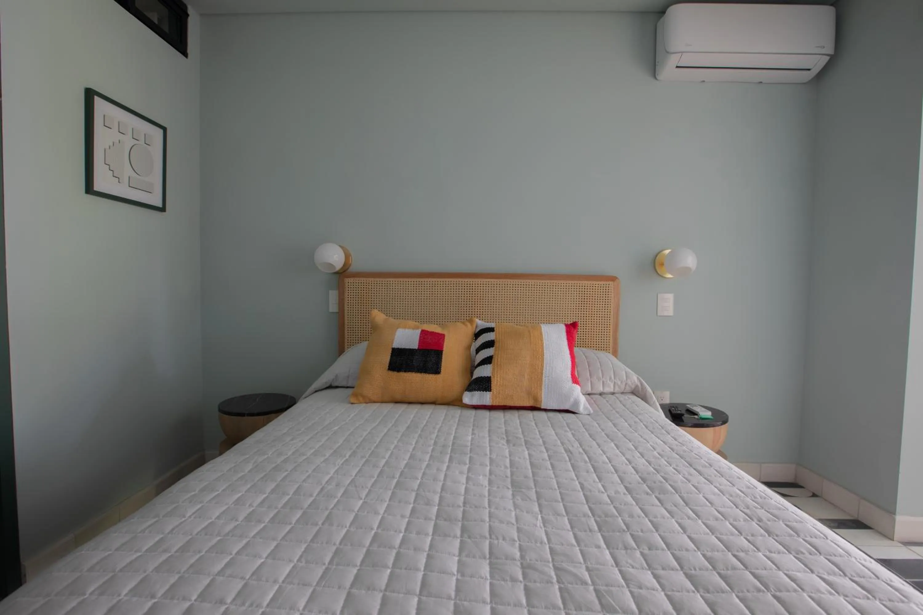 Bed in Casa Ixaya by Barrio México