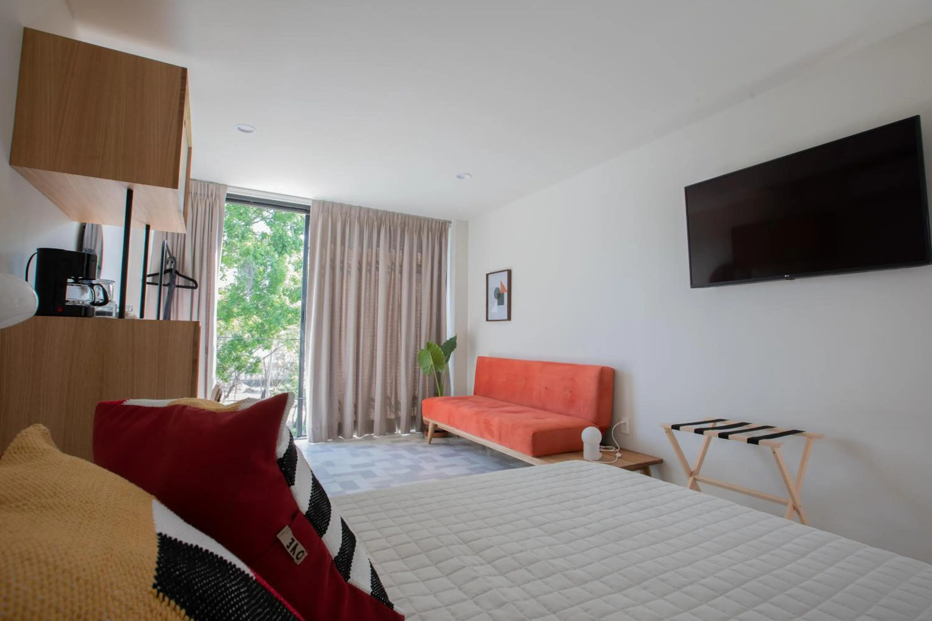 Bed in Casa Ixaya by Barrio México