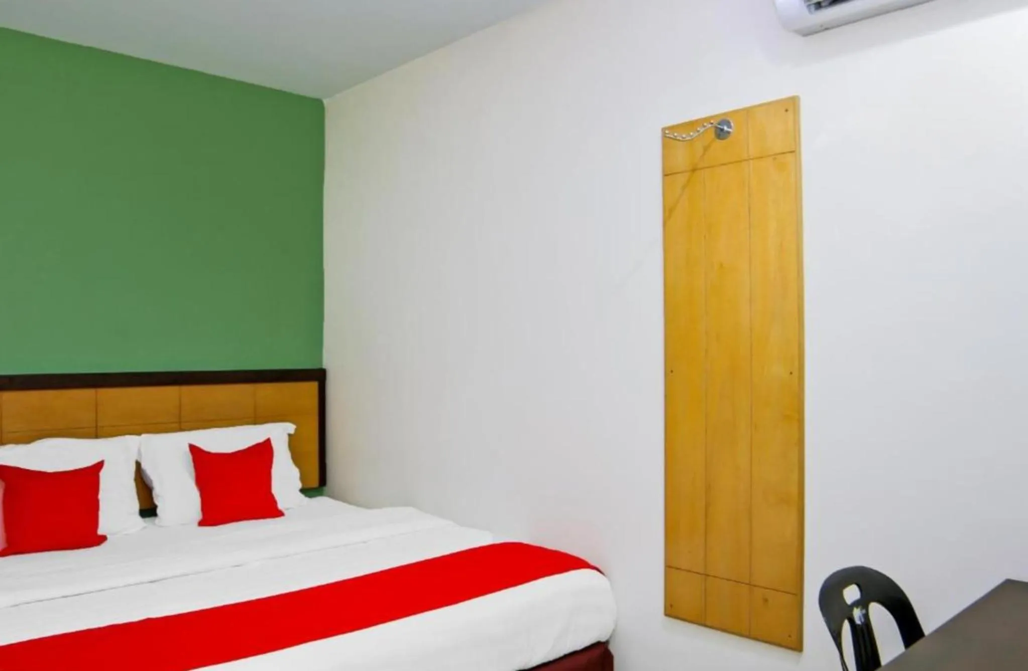 Bed in Holiday Mansion Inn Sibu