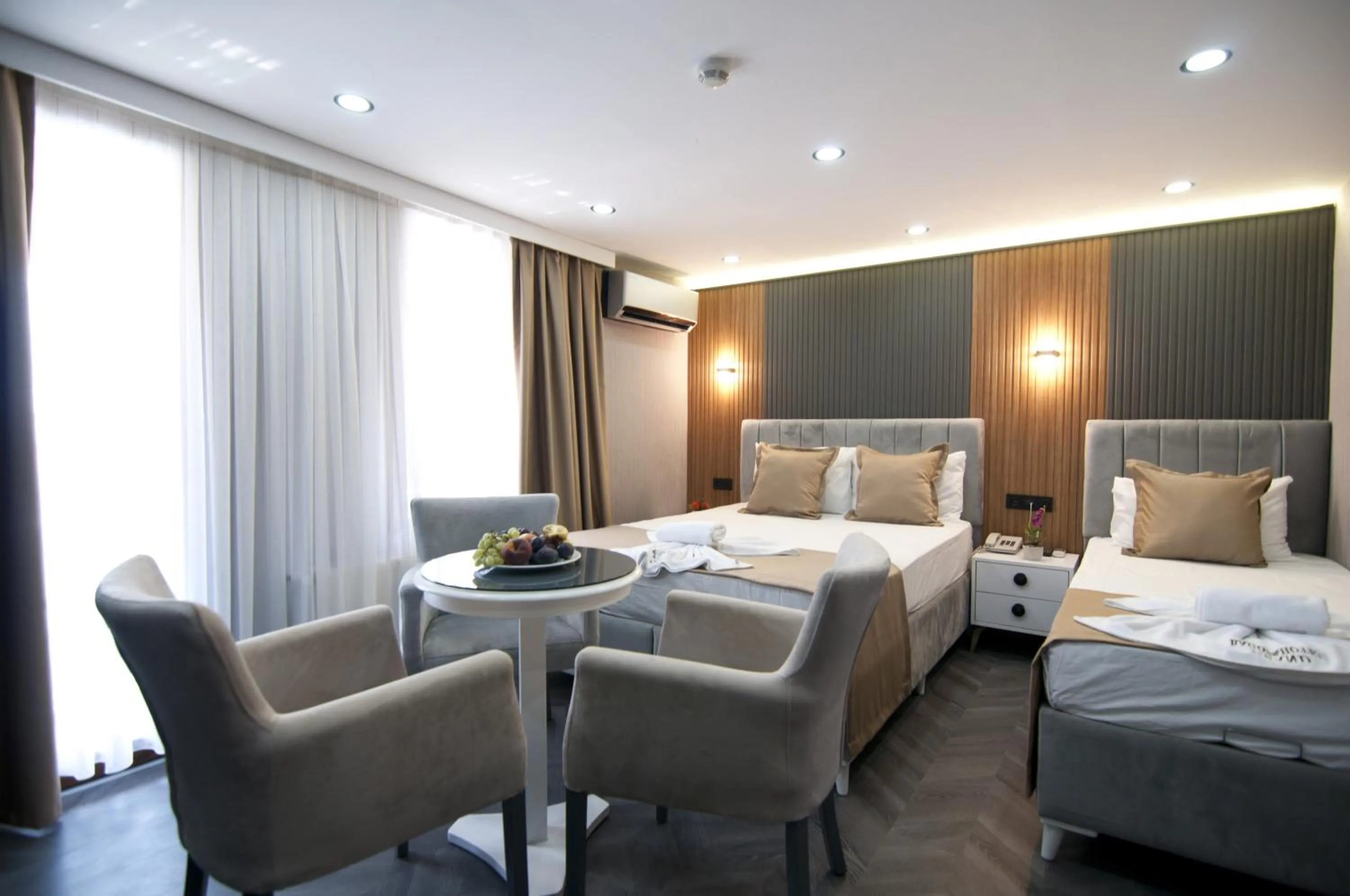 Photo of the whole room, Bed in Grand Bagoz Hotel