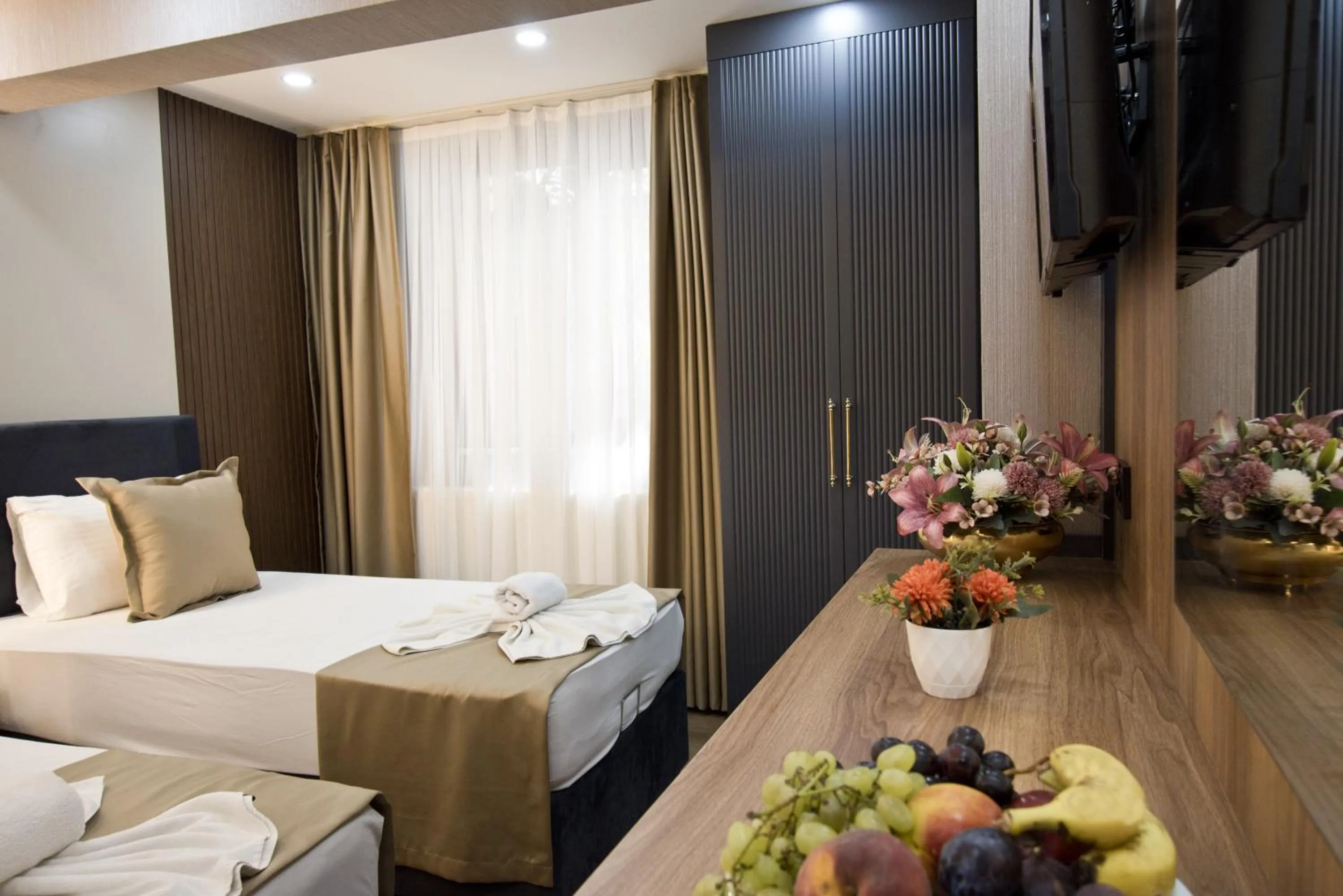 Photo of the whole room, Bed in Grand Bagoz Hotel