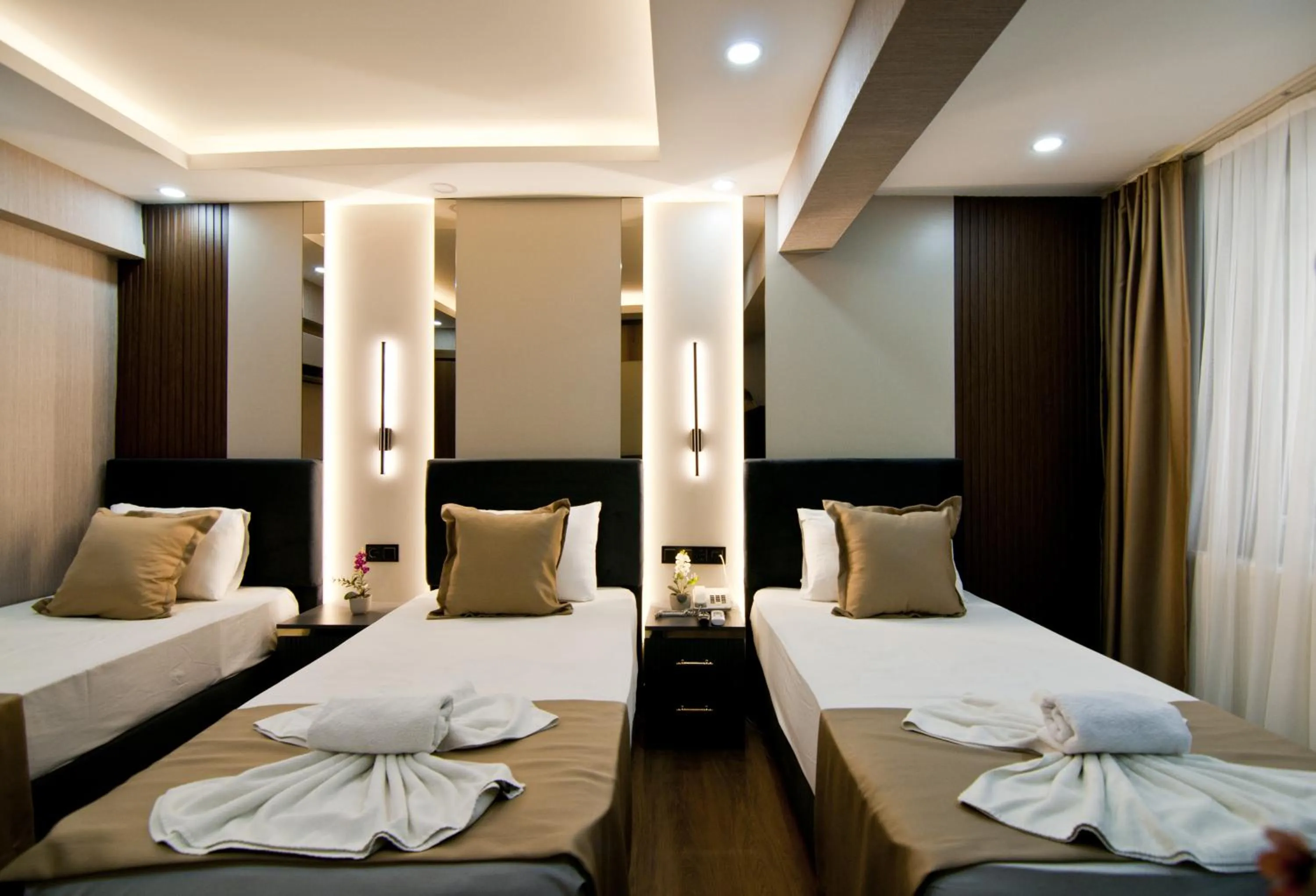 Photo of the whole room, Bed in Grand Bagoz Hotel